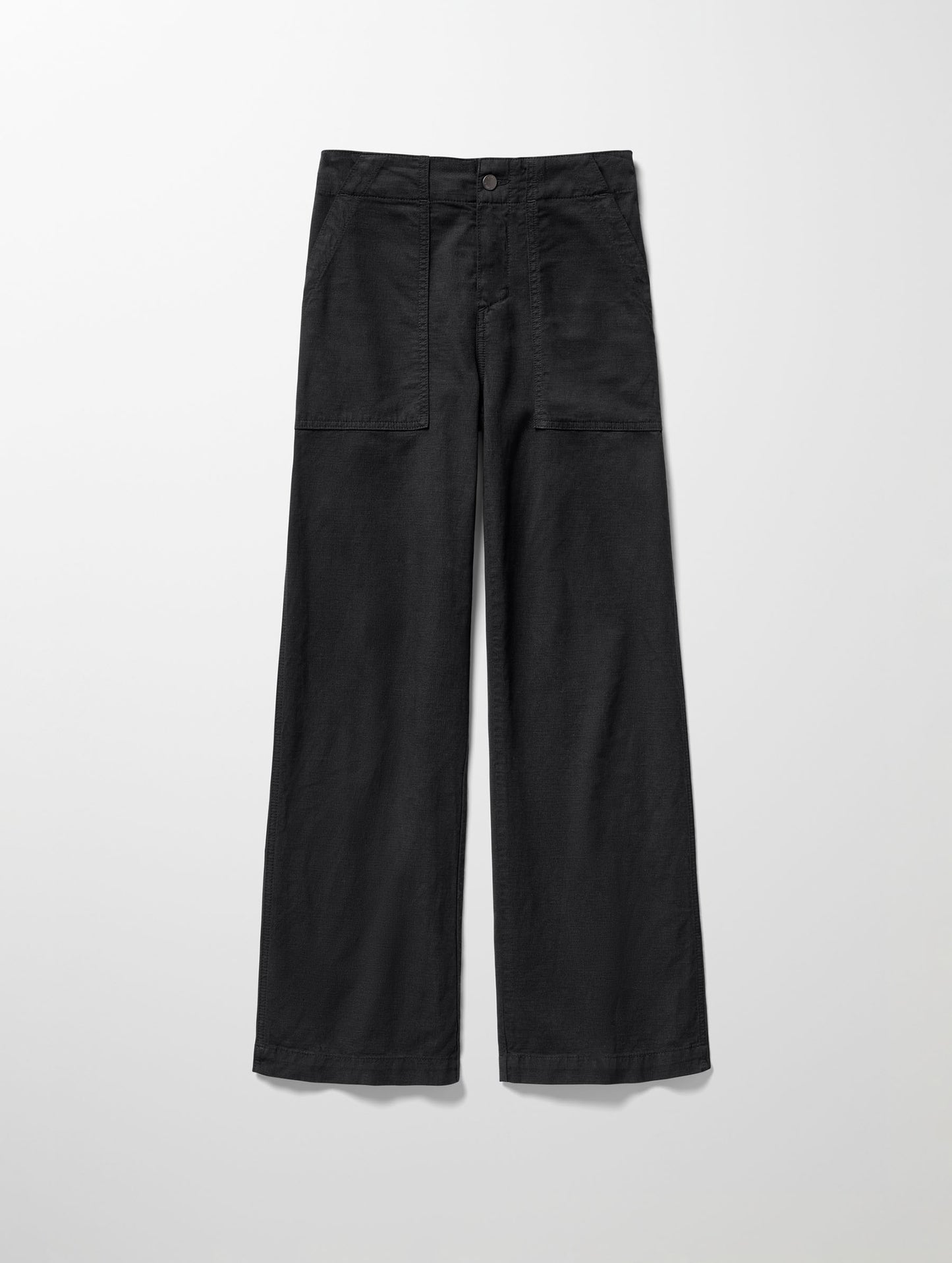 Flat lay image of Bella Travel Pant in Onyx Black from AETHER Apparel.