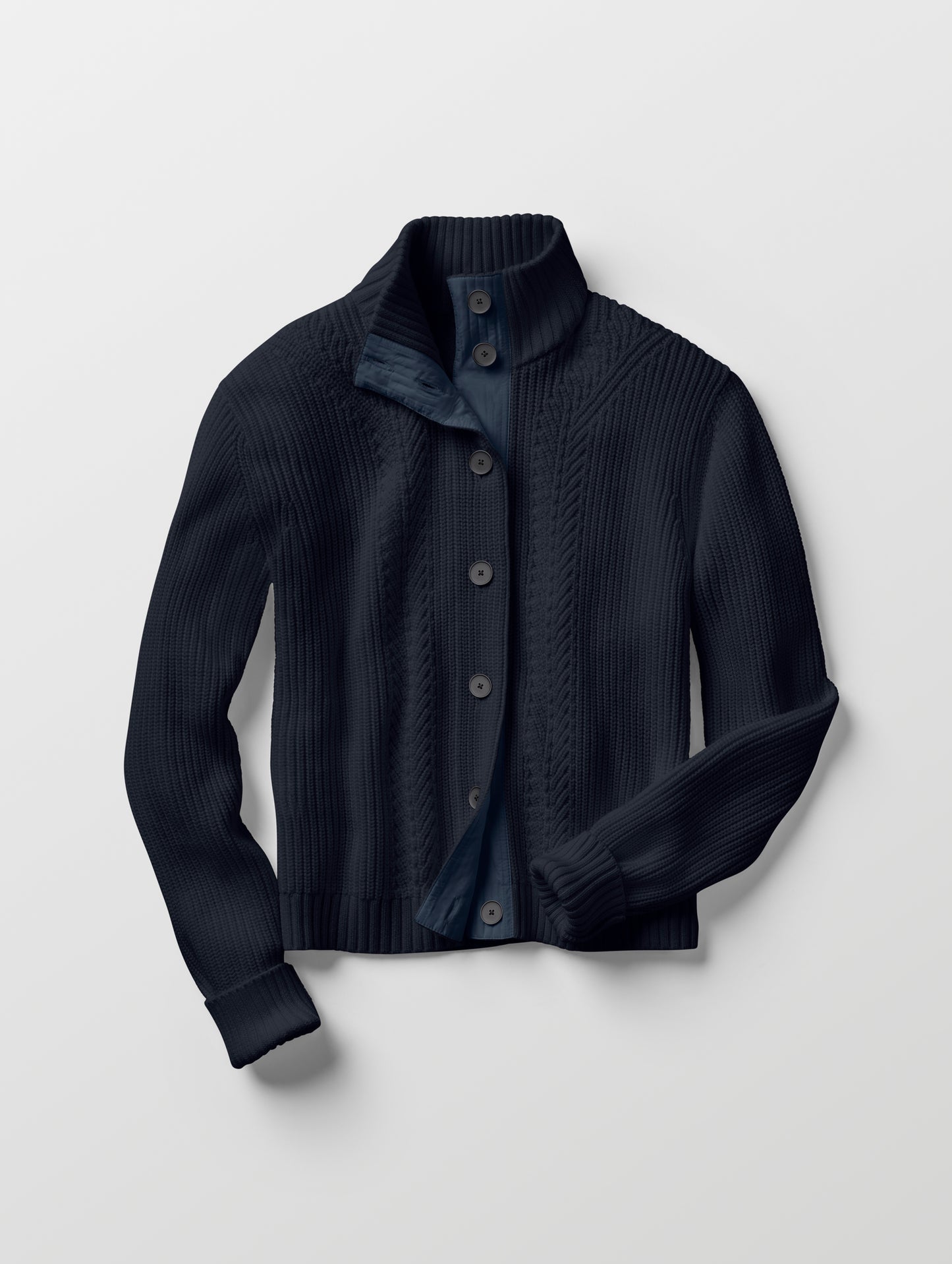 Flat lay of women's Cato Buttoned Sweater in Total Eclipse dark blue from AETHER Apparel.