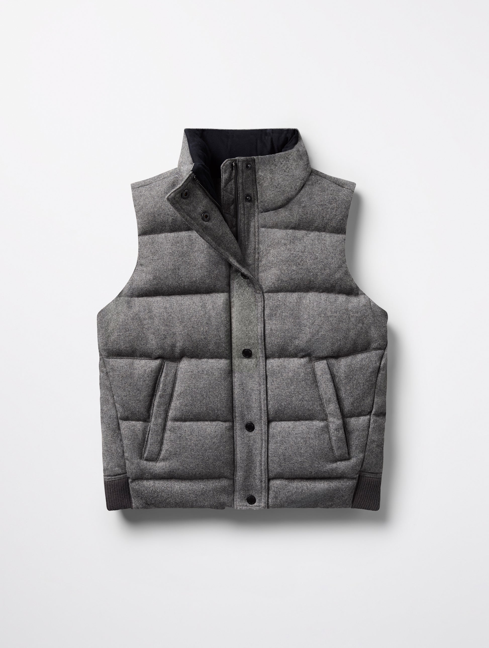 Flat lay of women's Channing Vest 2.0 in Heather Grey from AETHER Apparel.