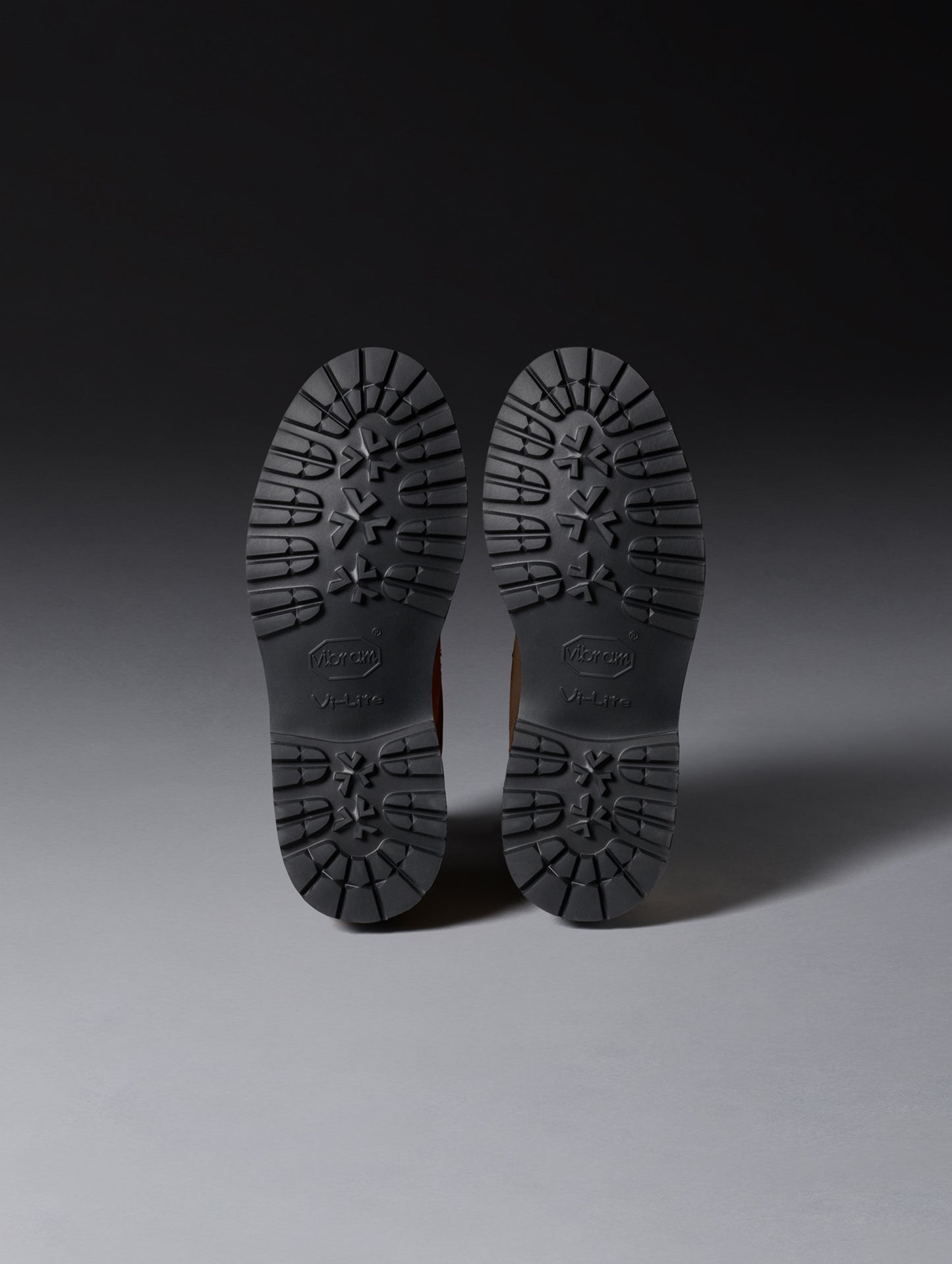 Bottom view of the Vibram outsoles on the Dolomite Boot in Taupe from AETHER Apparel.