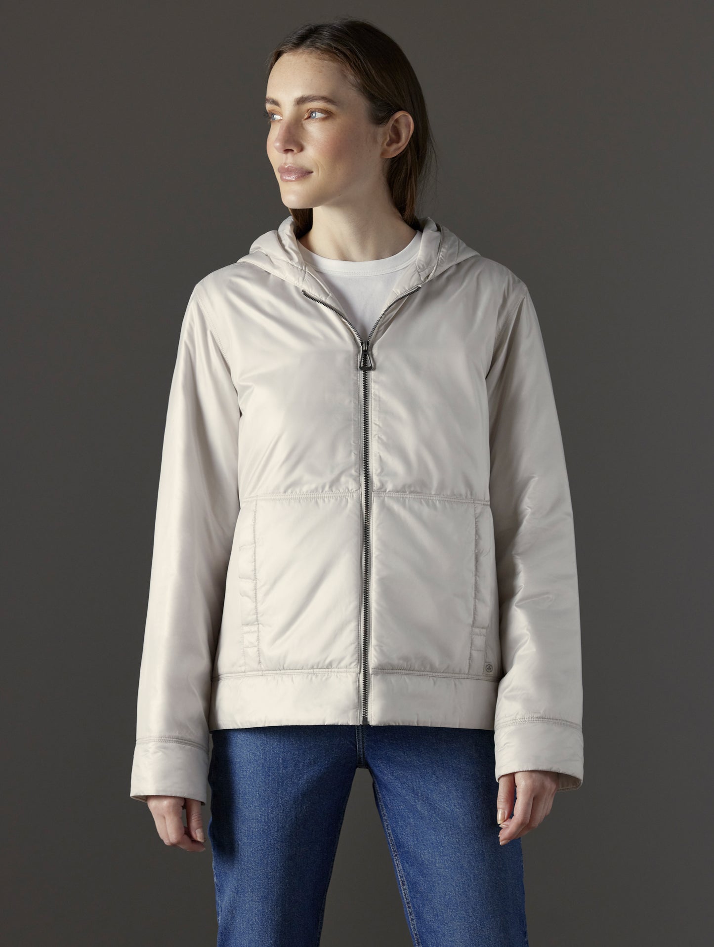 Front body view of woman wearing Eco Space Hoodie in Bone white from AETHER Apparel.
