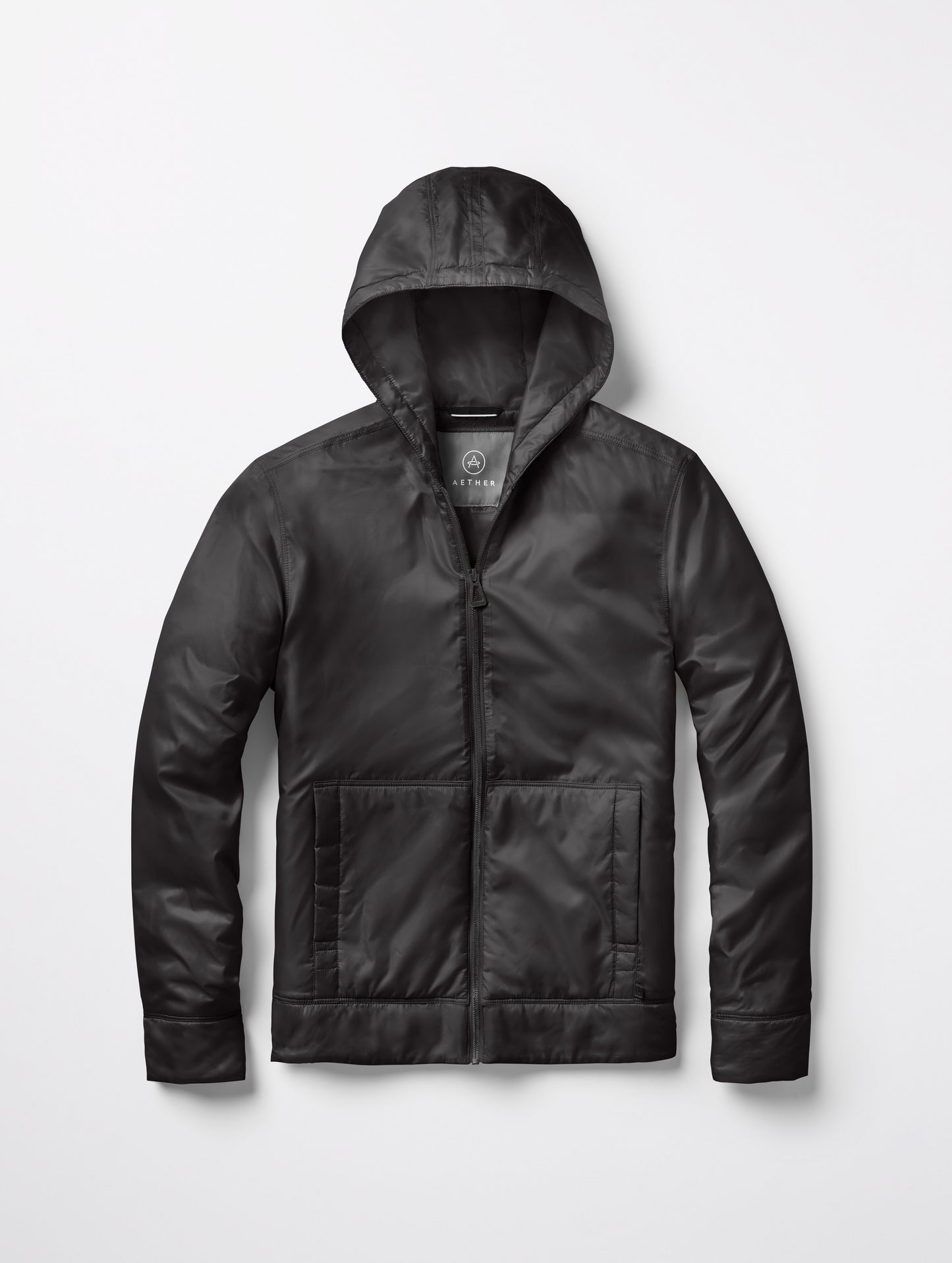 Flat lay of women's Eco Space Hoodie in Onyx Black from AETHER Apparel.