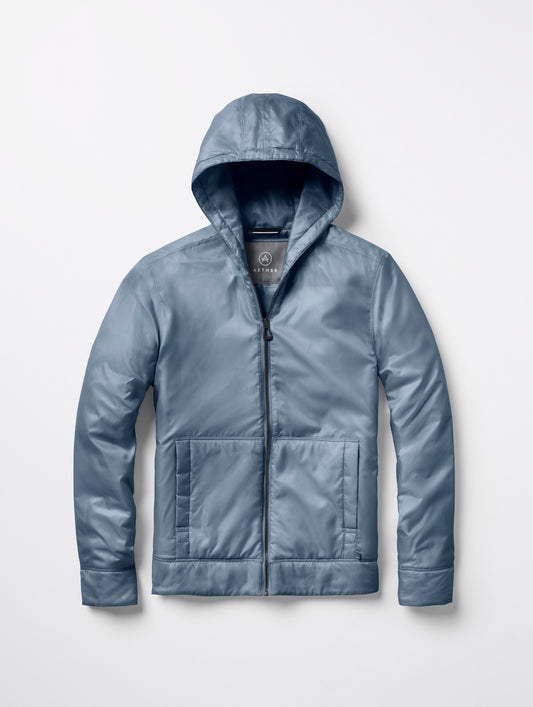 Flat lay of women’s Eco Space Hoodie in Portal Blue from AETHER Apparel.