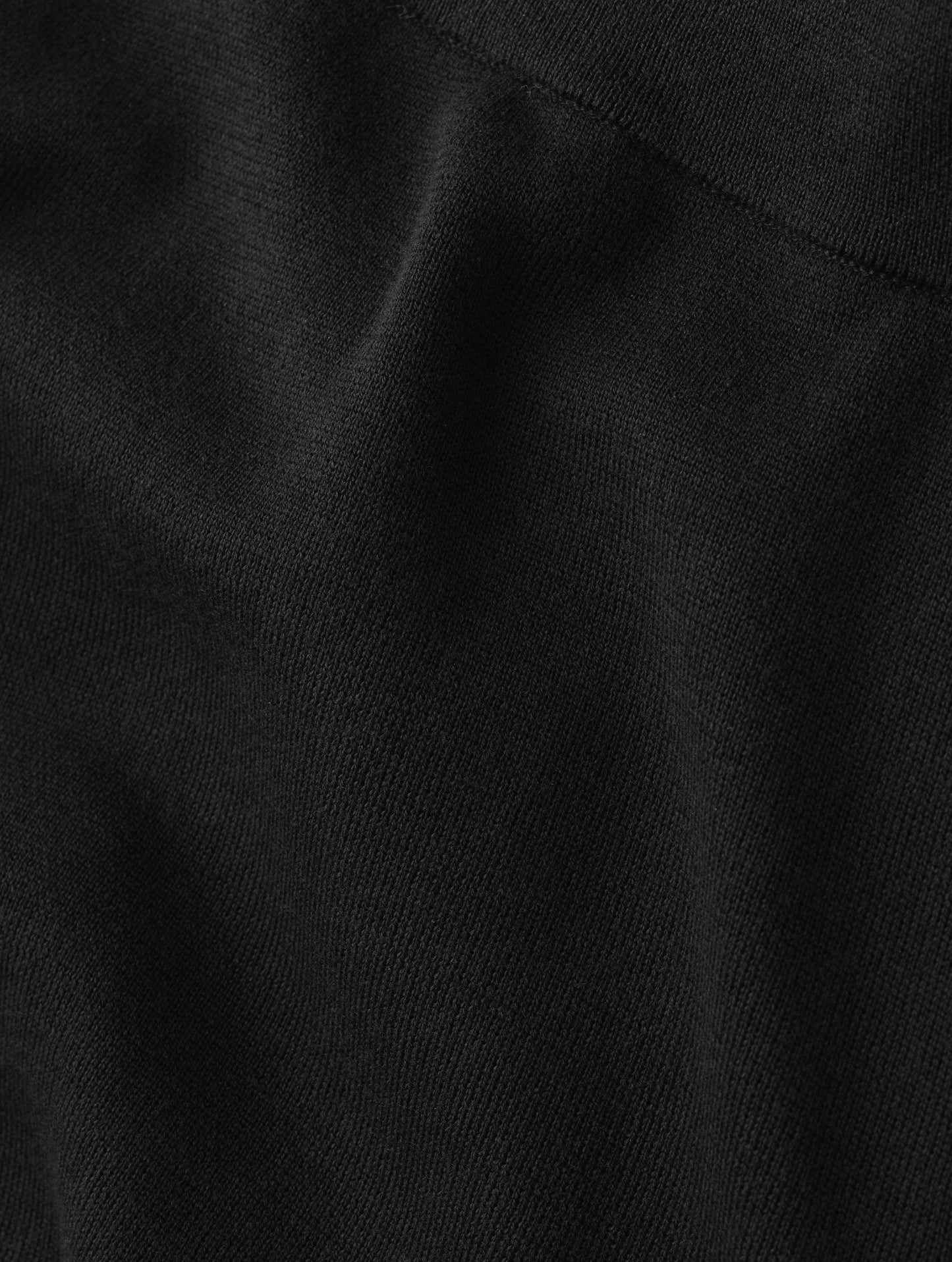 Closeup detailed view of the fabric on the Eliana Sweater Pant in Onyx Black from AETHER Apparel.