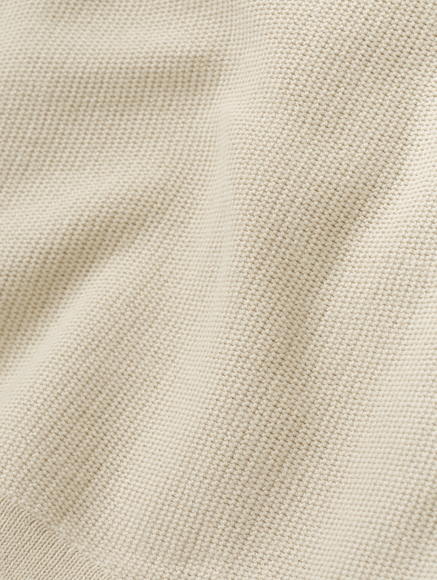 Closeup detailed view of the fabric on the Eliana Sweater Tee in Bone from AETHER Apparel.