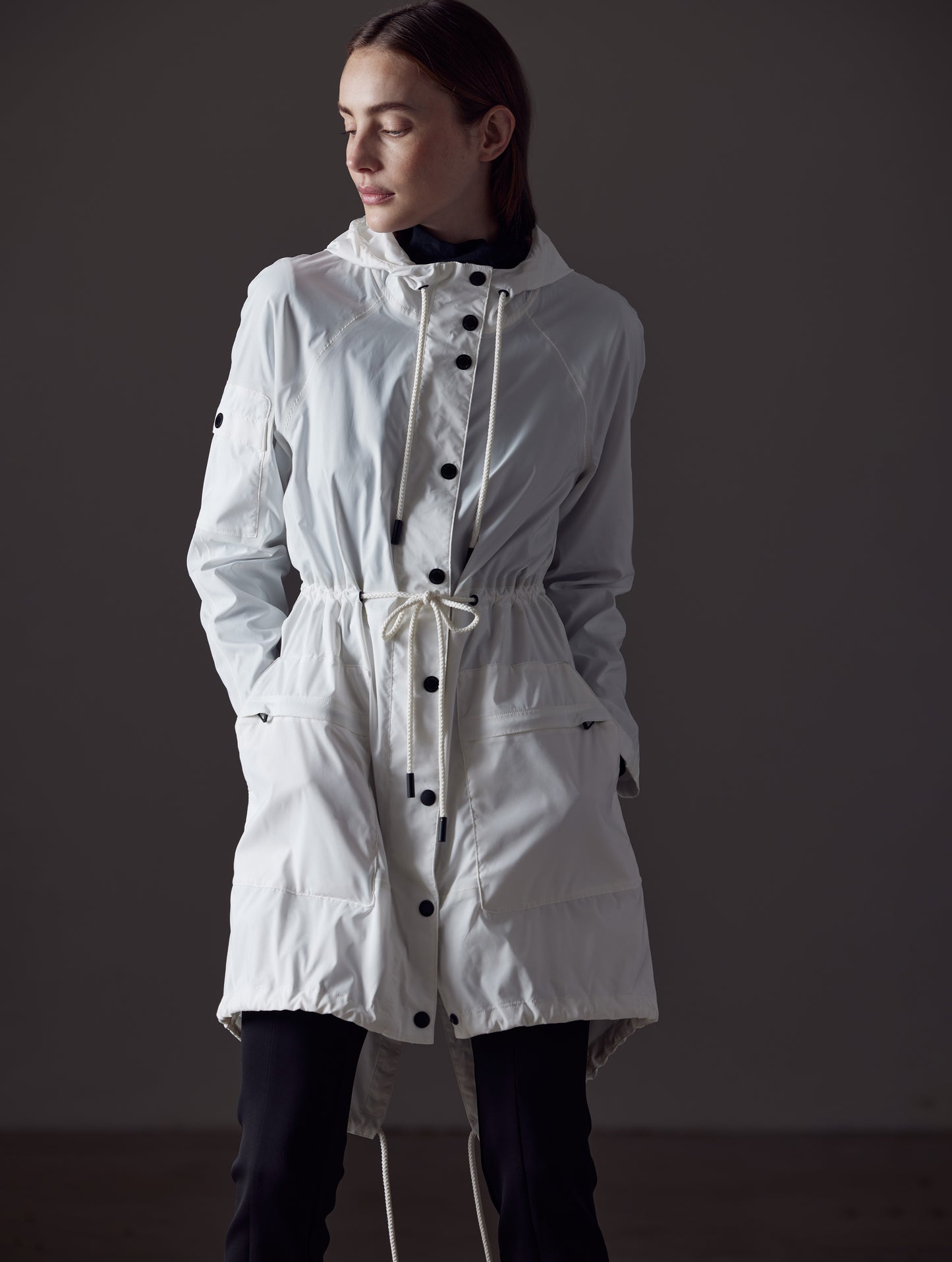 woman wearing white jacket from AETHER Apparel