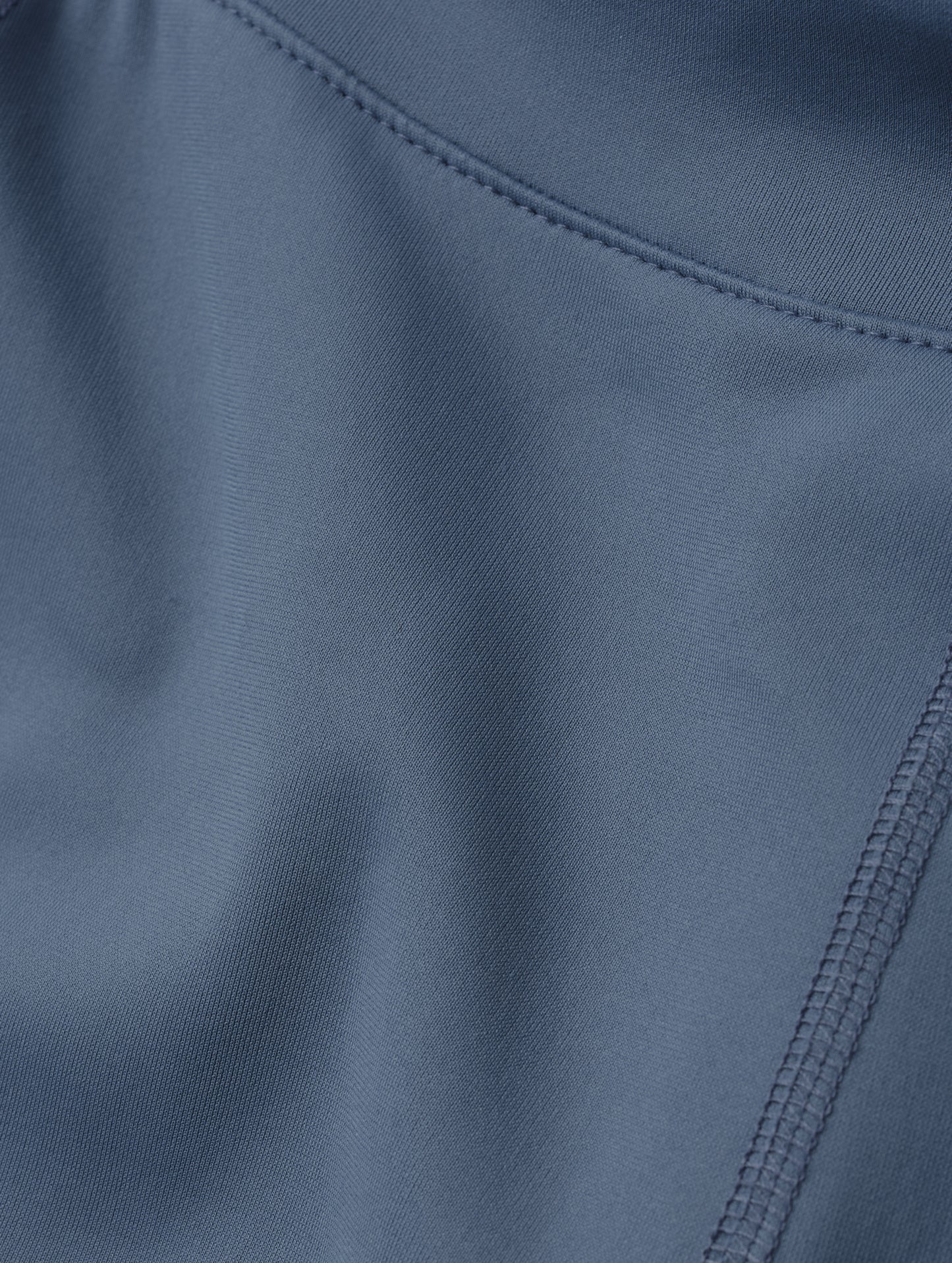 Closeup detailed view of the fabric on the Laurel Legging in Portal Blue from AETHER Apparel.