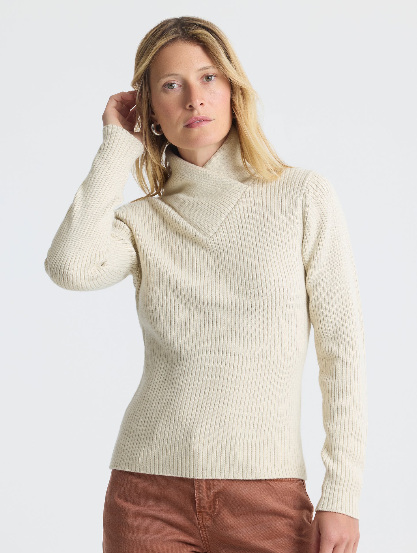 Upper body view of woman wearing Lexington Sweater in Bone white from AETHER Apparel.