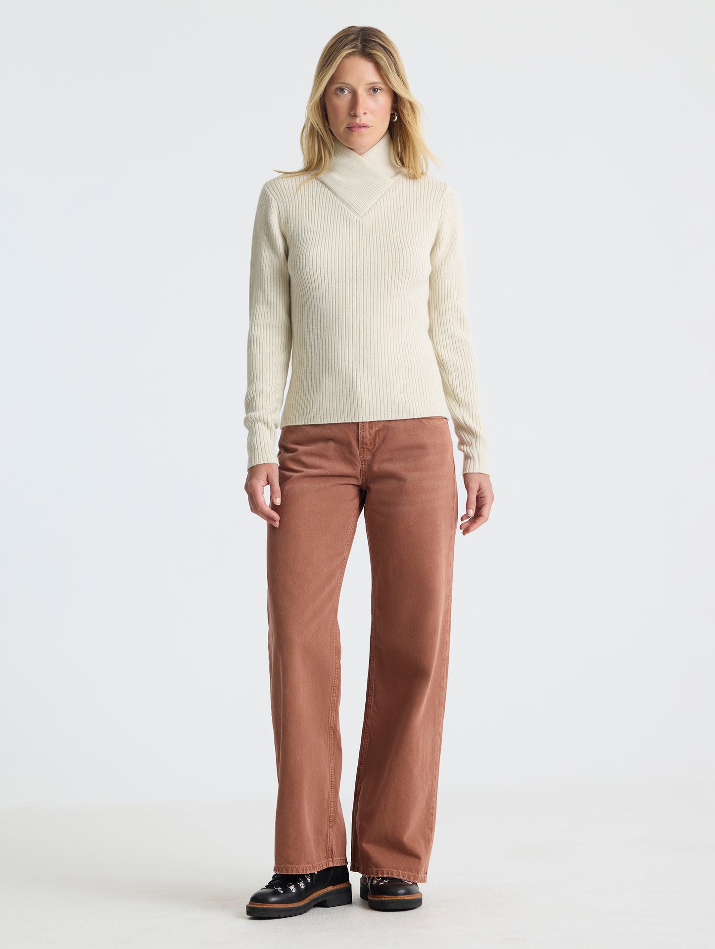 Full body view of woman wearing Lexington Sweater in Bone white from AETHER Apparel.