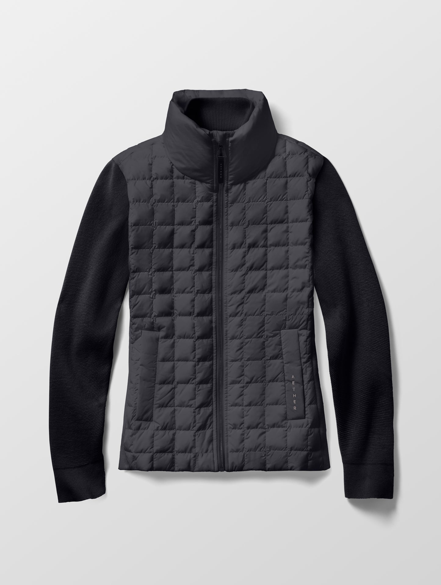 Flat lay of the Phase Full-Zip in Onyx Black from AETHER Apparel.