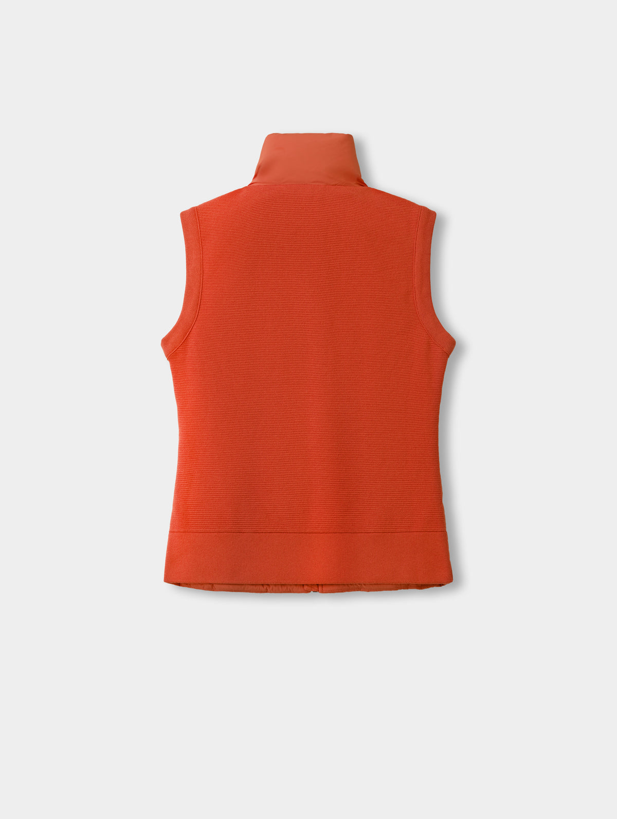 Flat lay view of the back of the Phase Vest in Madeira Orange from AETHER Apparel.