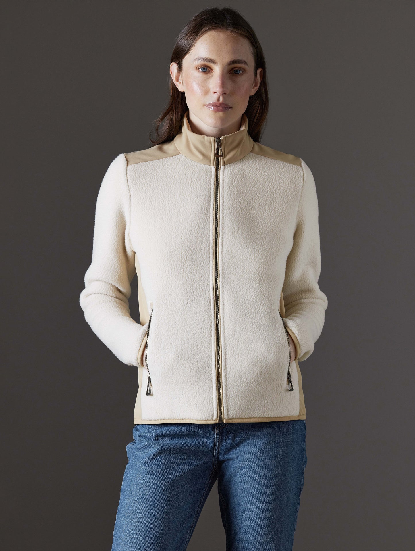Front body view of woman wearing Walsh Full-Zip 2.0 in Bone and Desert Tan from AETHER Apparel.