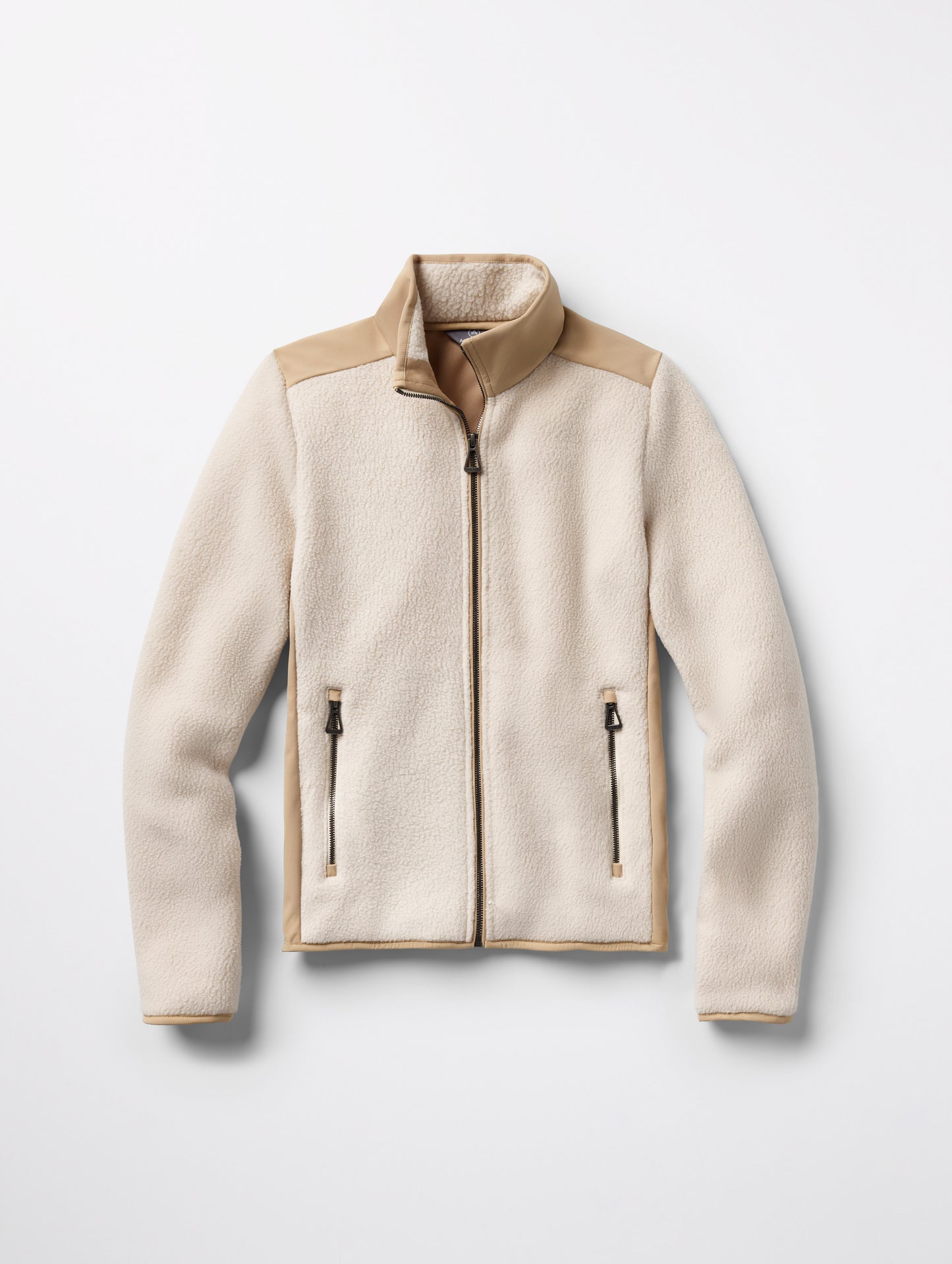 Flat lay of women’s Walsh Full-Zip 2.0 in Bone and Desert Tan from AETHER Apparel.