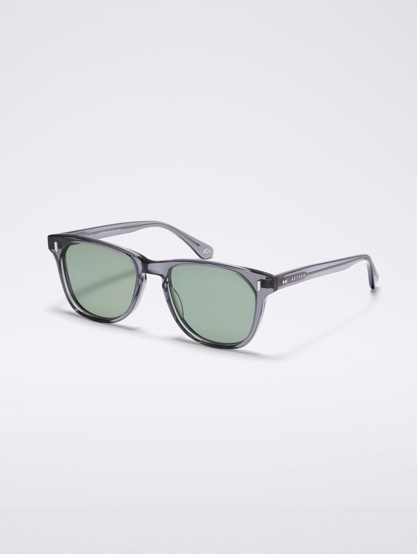 Front 3/4 view of Yosemite Sunglass in transparent Grey with Grey Lens from AETHER Apparel.