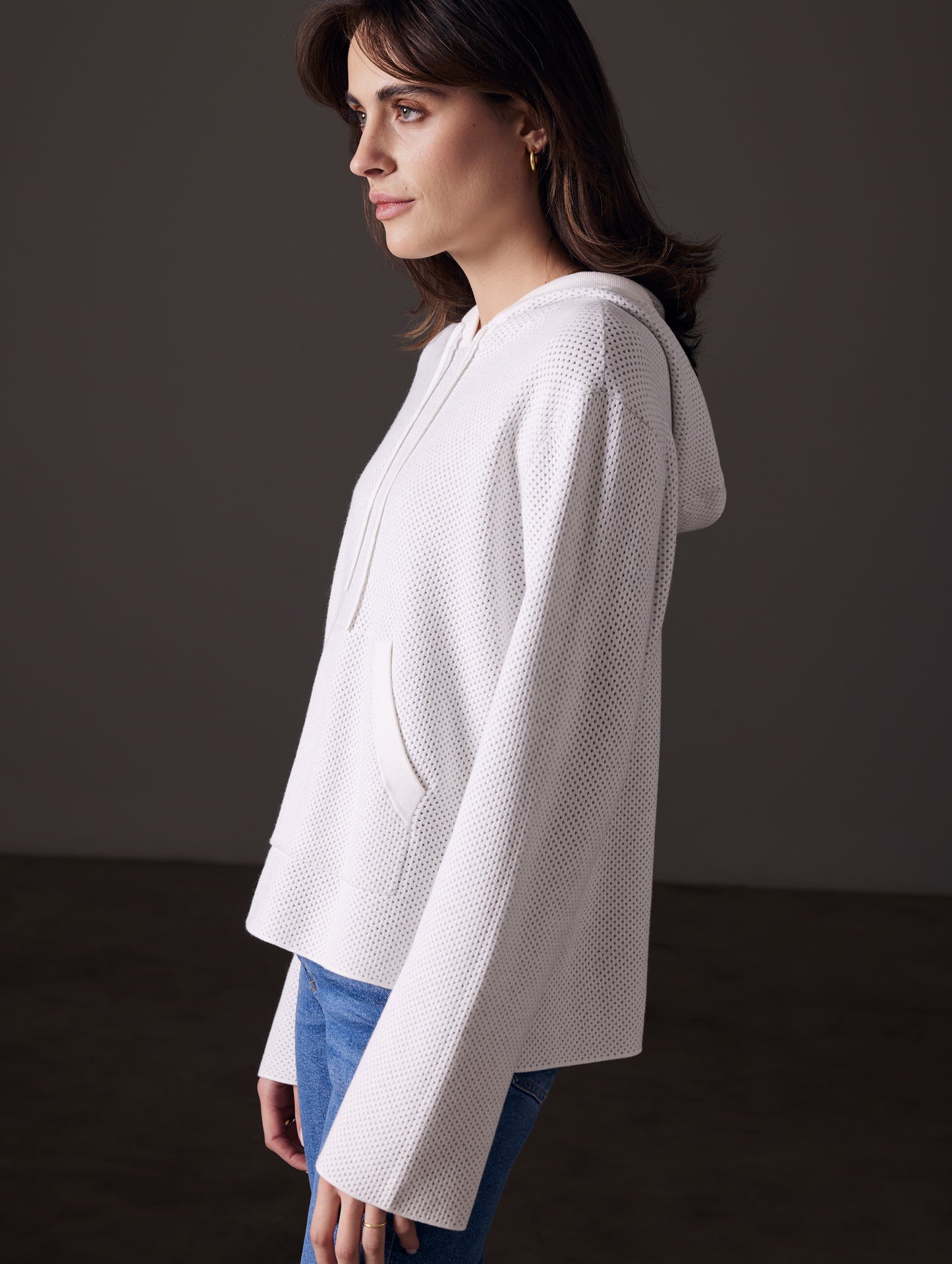 woman wearing beige sweater from AETHER Apparel
