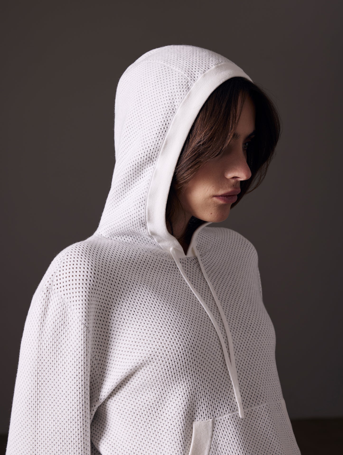 woman wearing beige sweater from AETHER Apparel