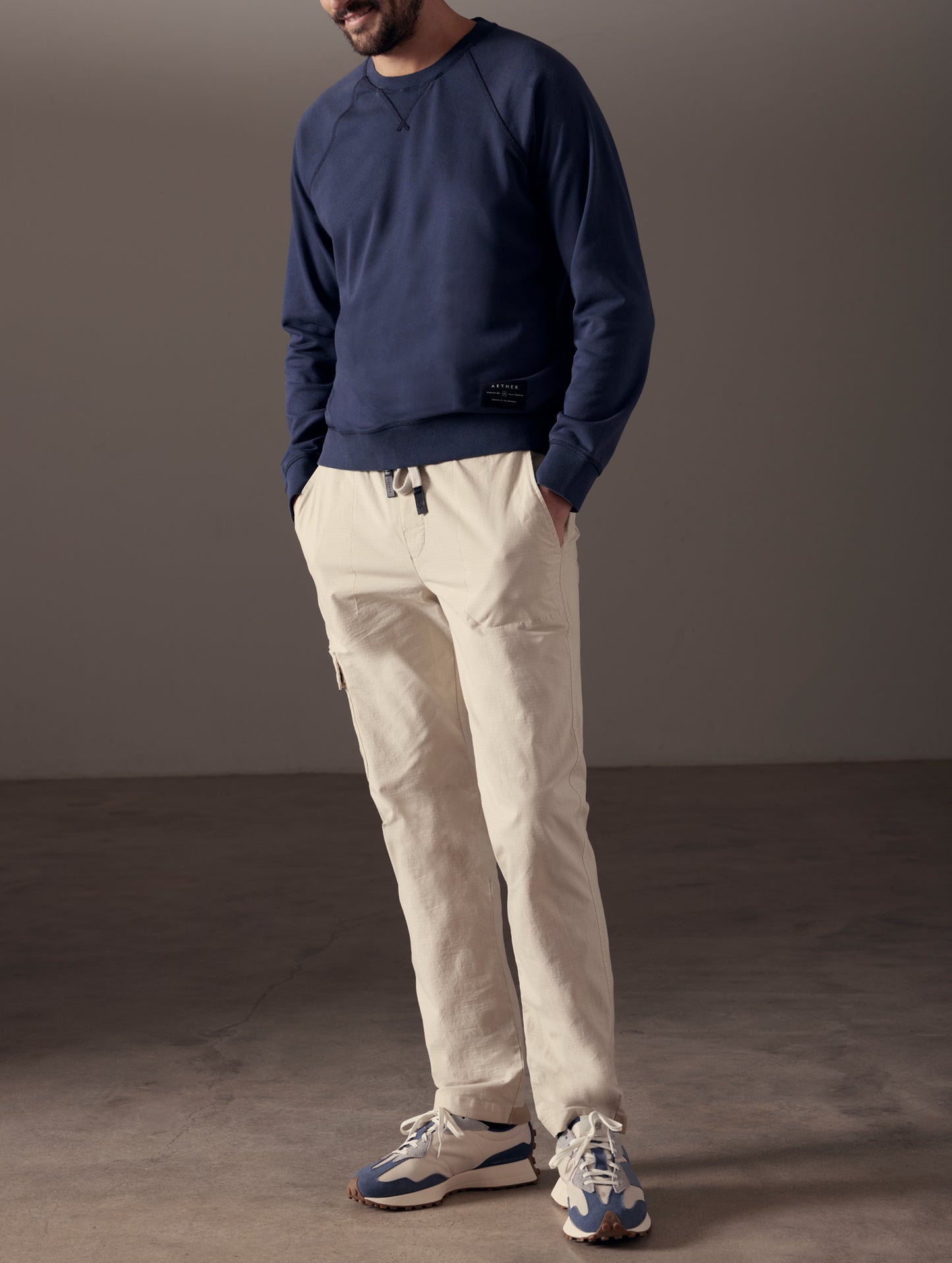 man wearing beige cotton ripstop pants