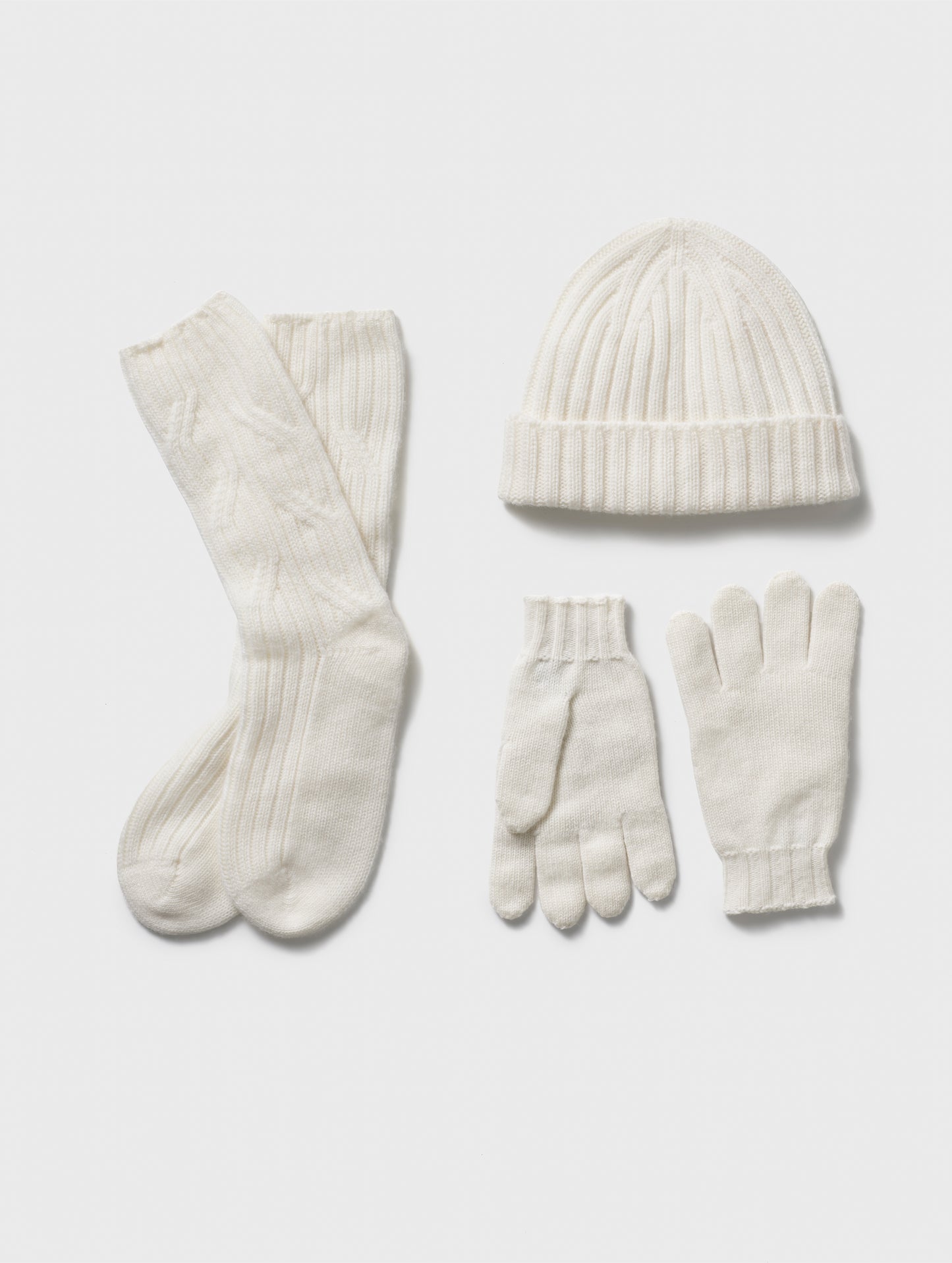 Flay lay of Cashmere Accessories Set in Winter White from AETHER Apparel.