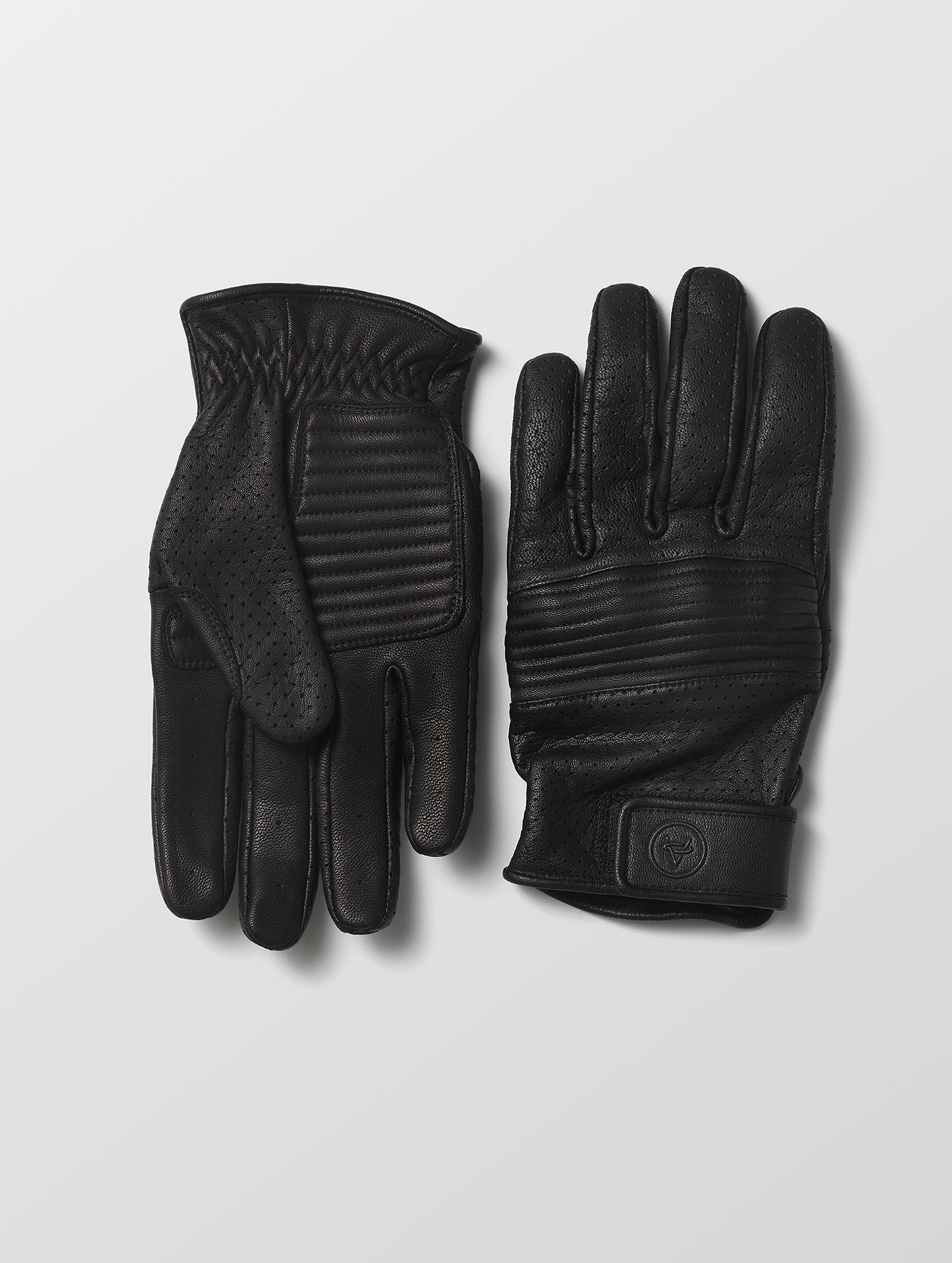 Flat lay of Moto Glove in Onyx Black from AETHER Apparel.