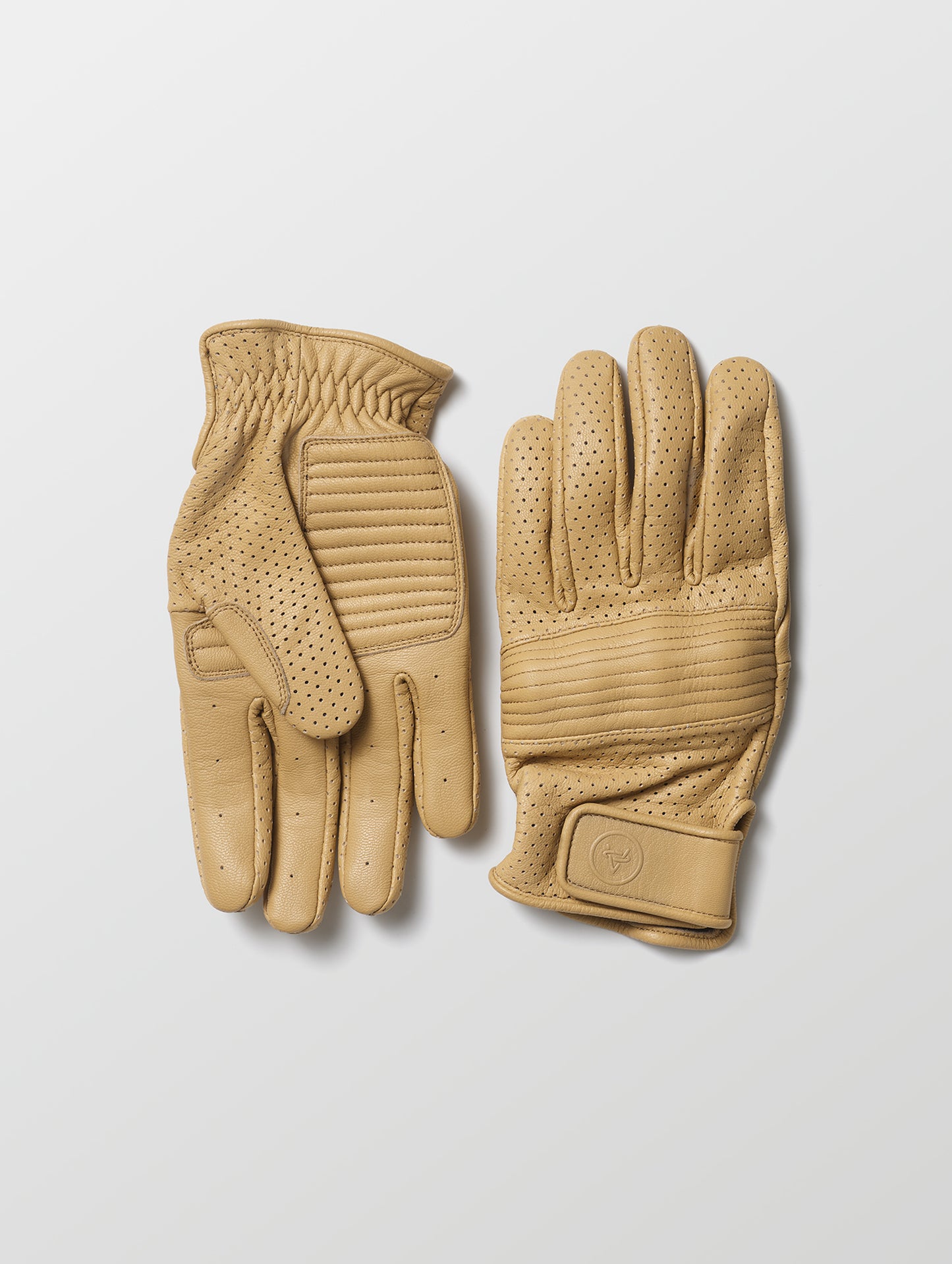 Flat lay of Moto Glove in Sand from AETHER Apparel.