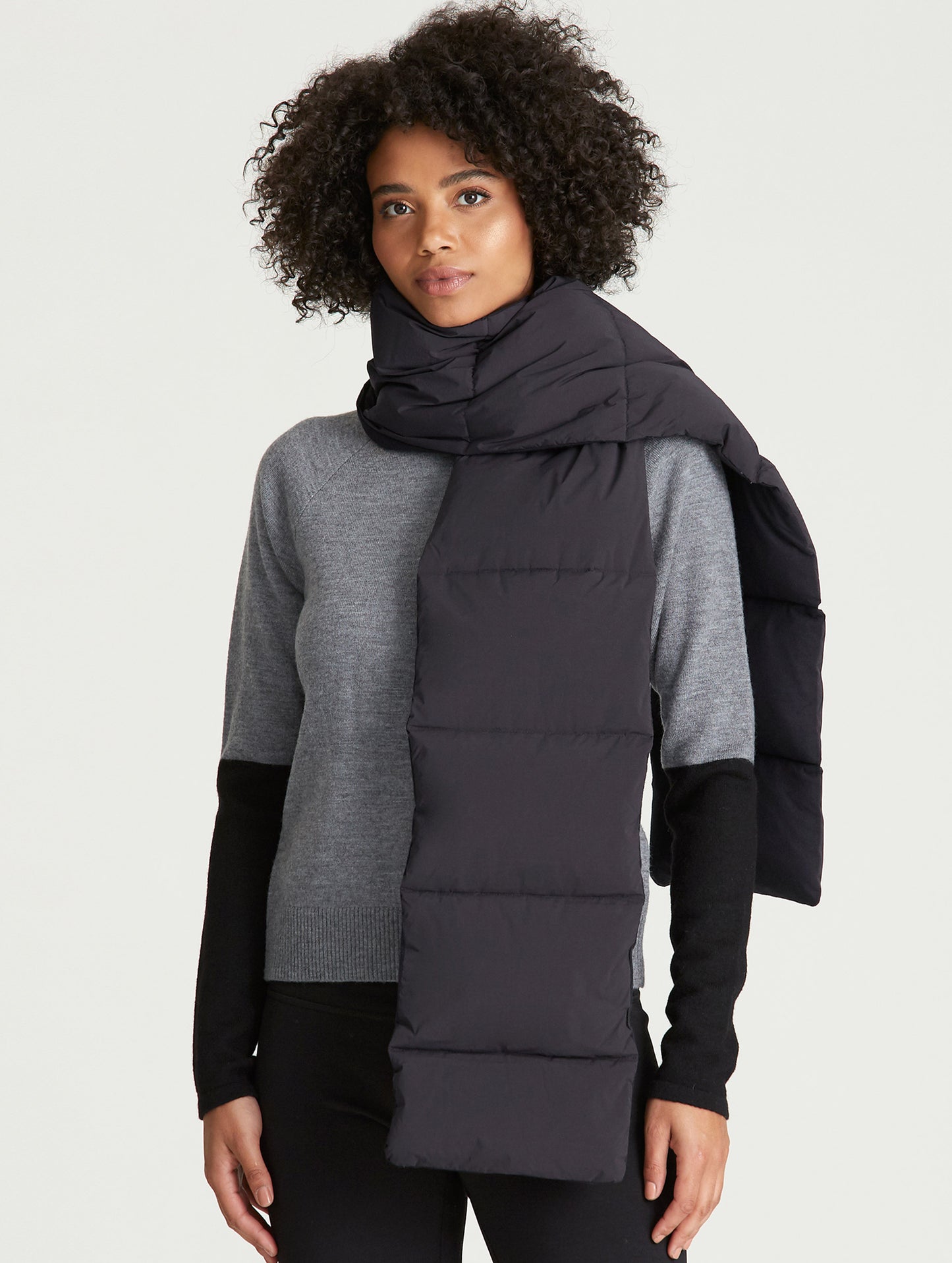 woman wearing black quilted scarf