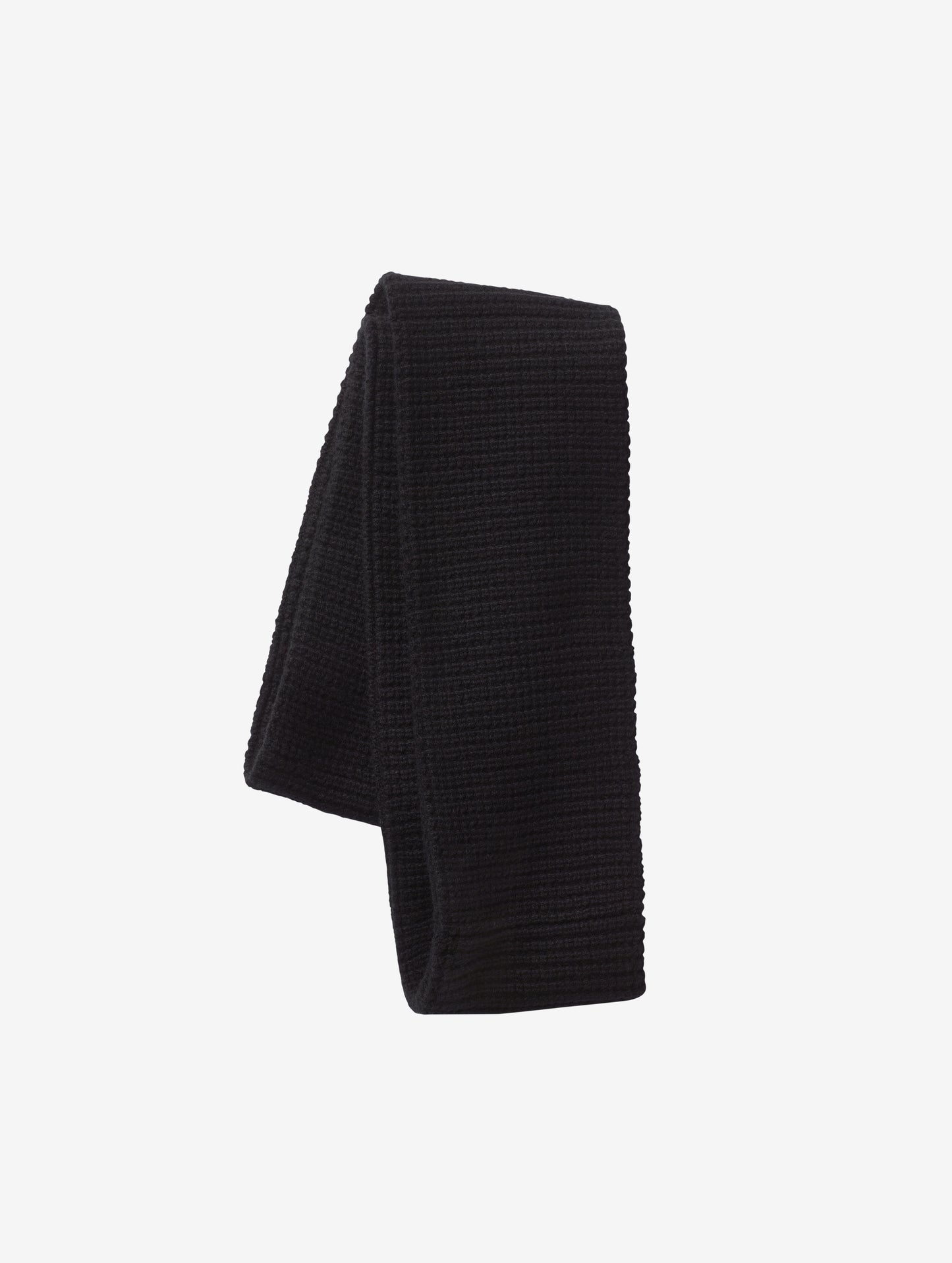 Isolated view of folded, black Waffle Circle Scarf from AETHER Apparel.