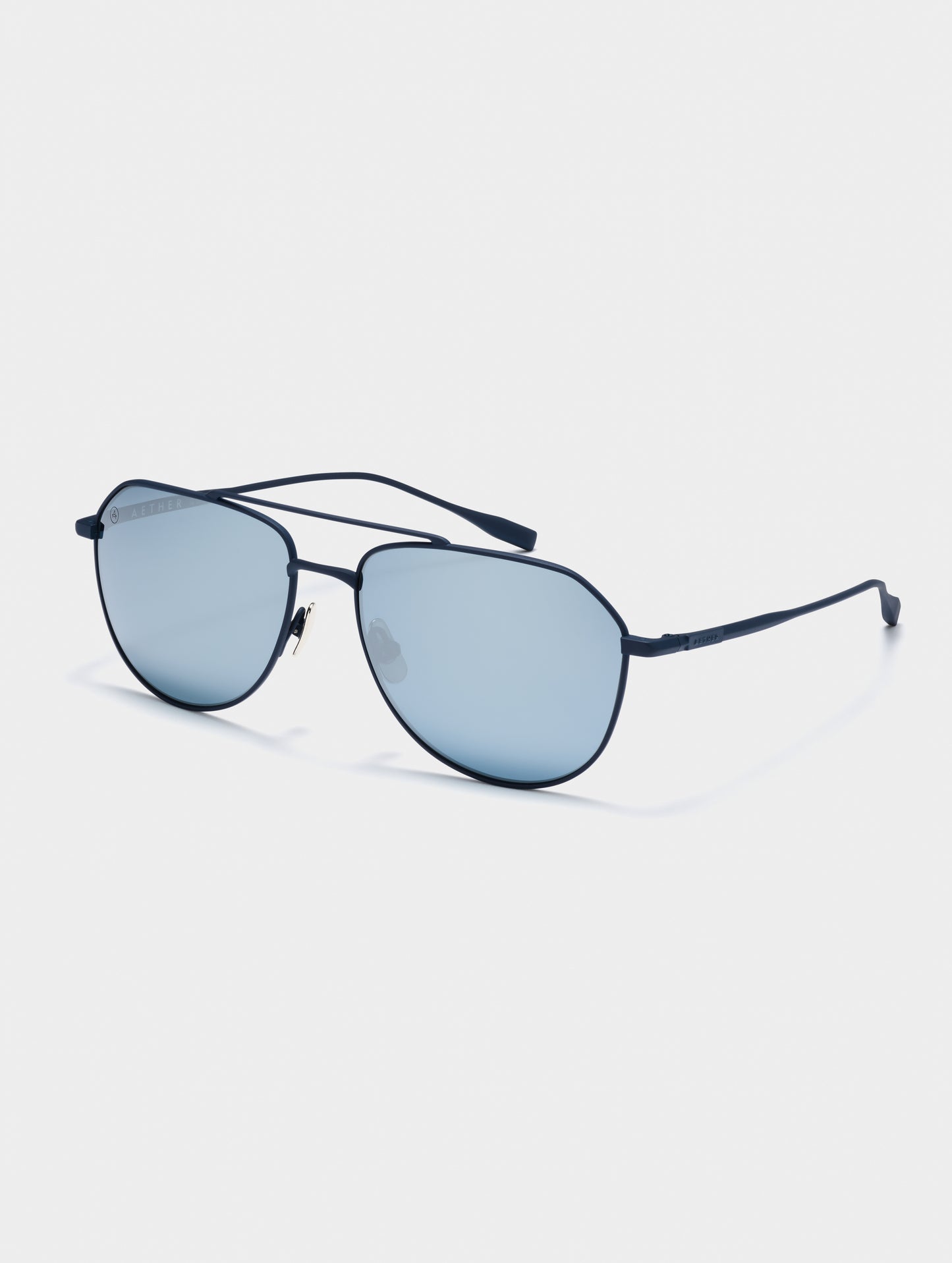 Front 3/4 view of Bryce Sunglass in black titanium with Blue Lens from AETHER Apparel.