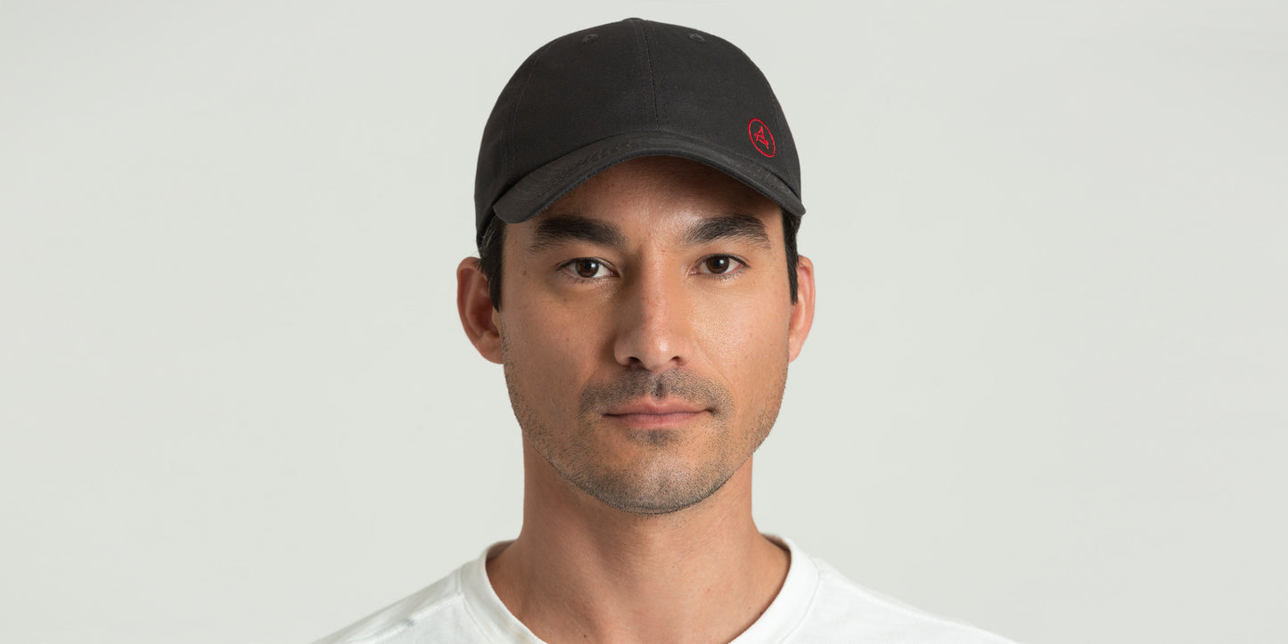 Front view of man wearing Everyday Hat in Graphite from AETHER Apparel.