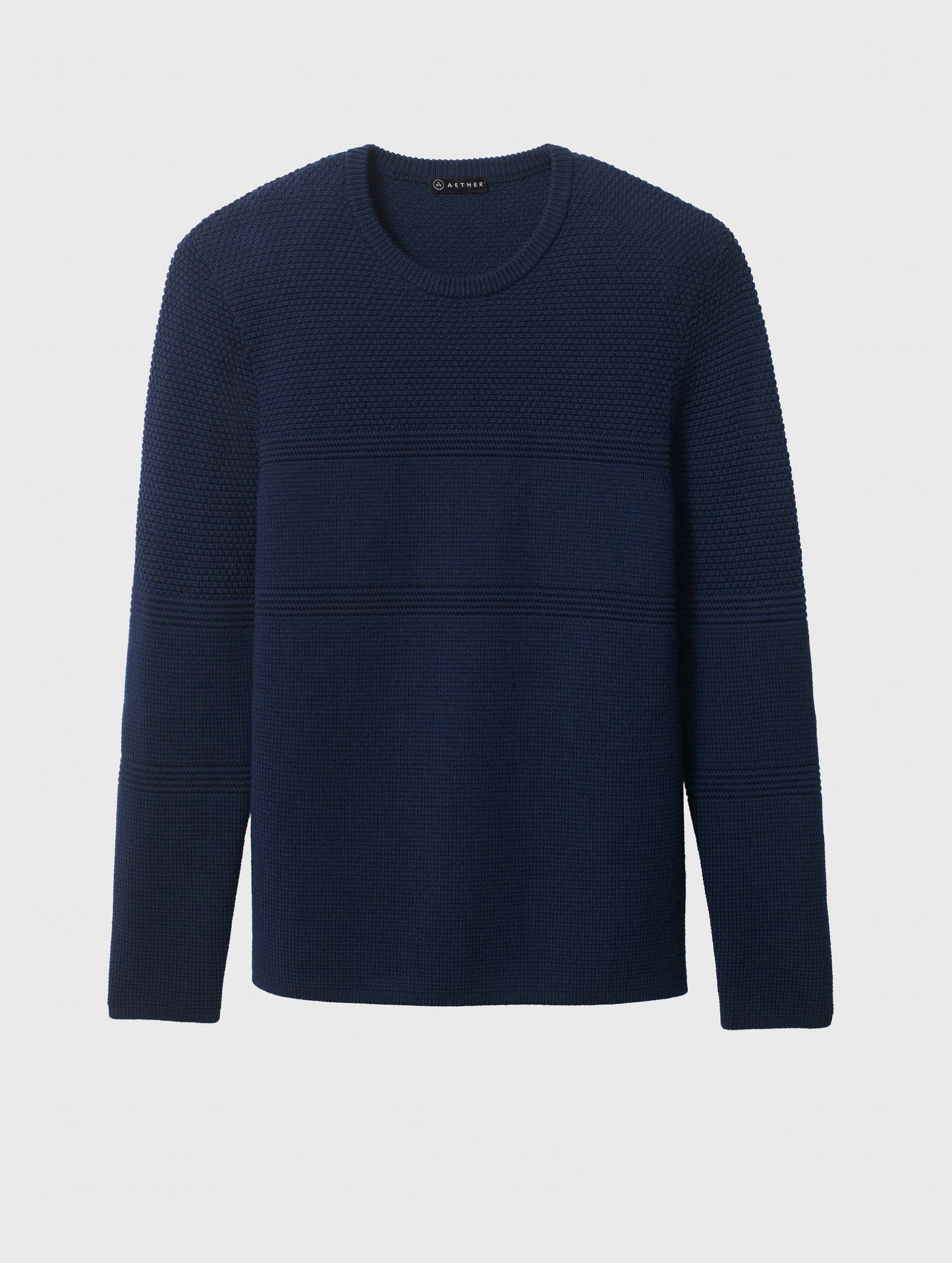 Flat lay of Cooper Sweater in Nordic Navy blue from AETHER Apparel.