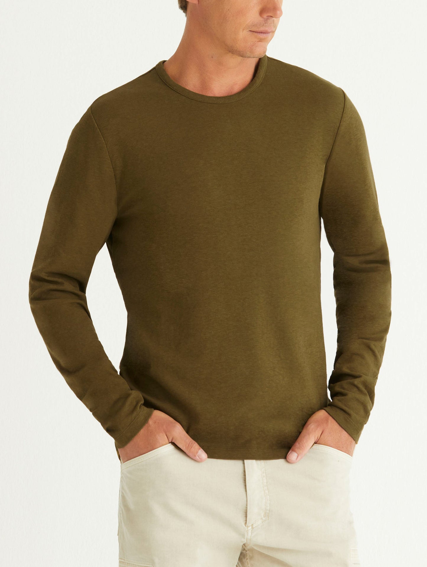 man wearing green long sleeve shirt