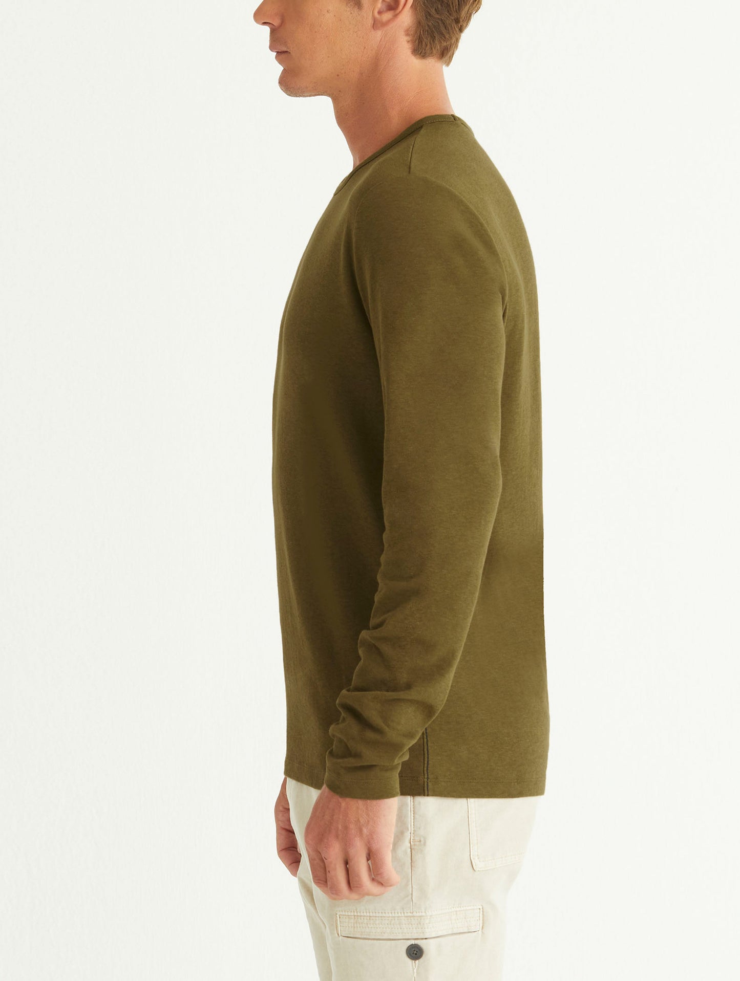 man wearing green long sleeve shirt