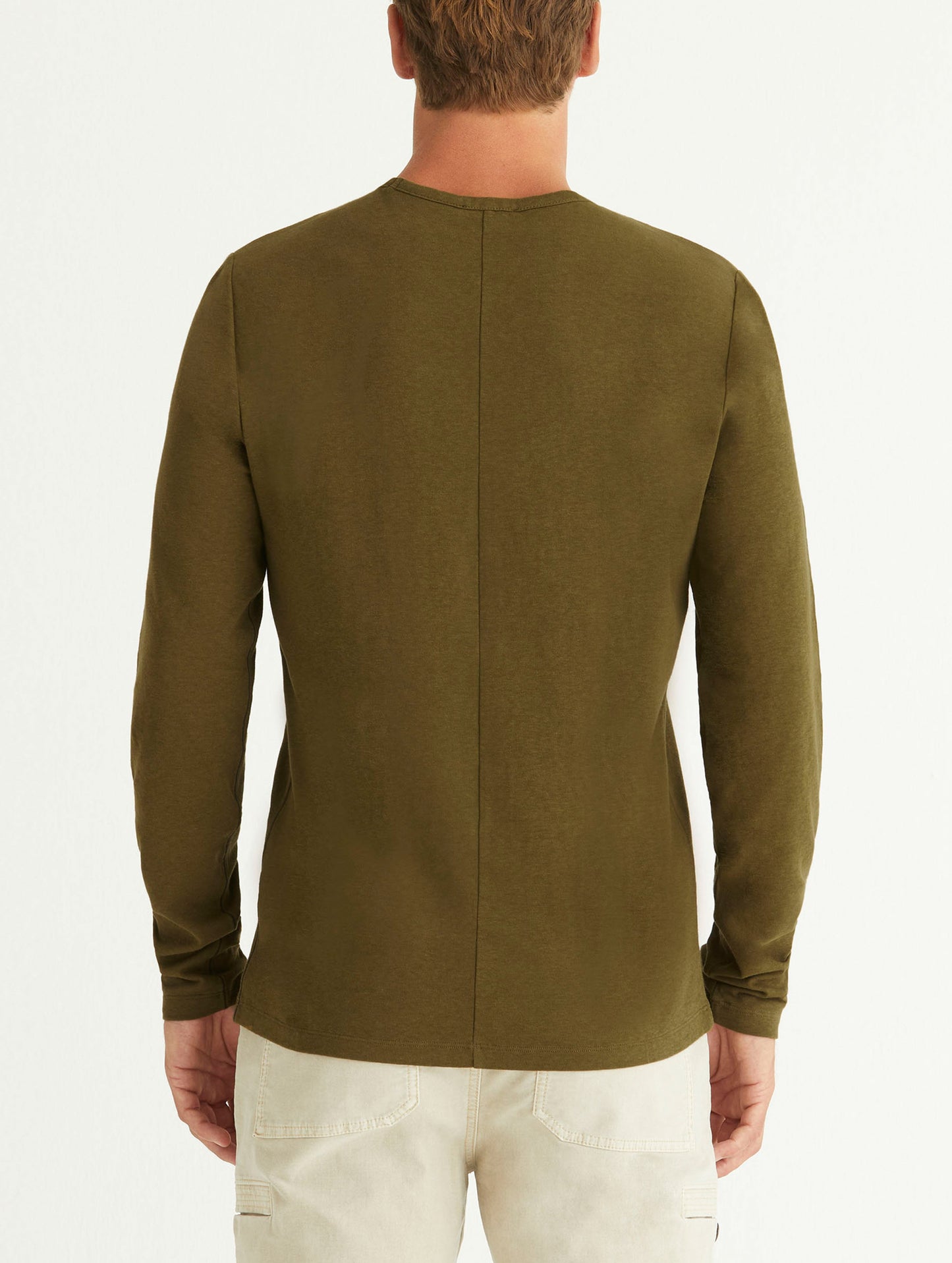 man wearing green long sleeve shirt