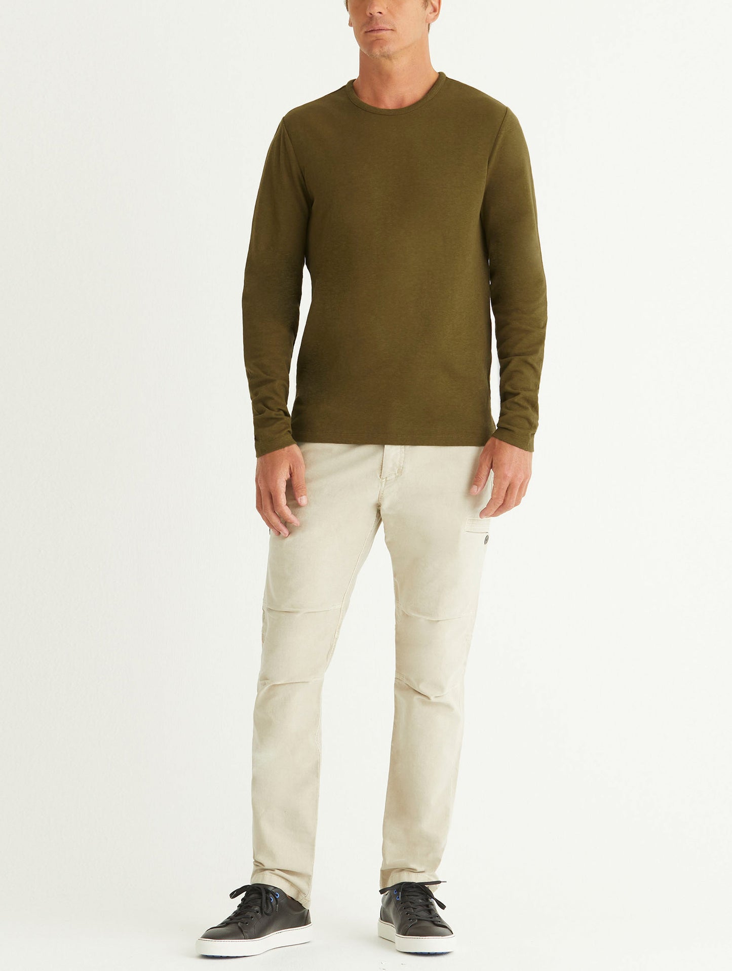 man wearing green long sleeve shirt