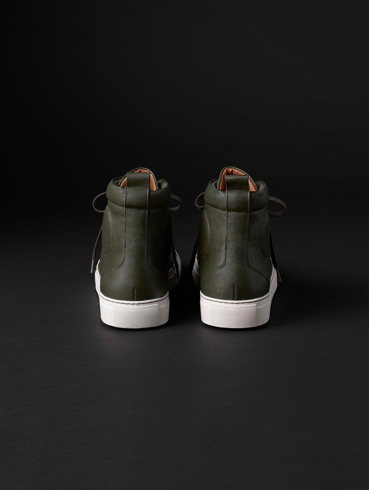 Rear view of men’s Dalton Sneaker in Duffle Green from AETHER Apparel.