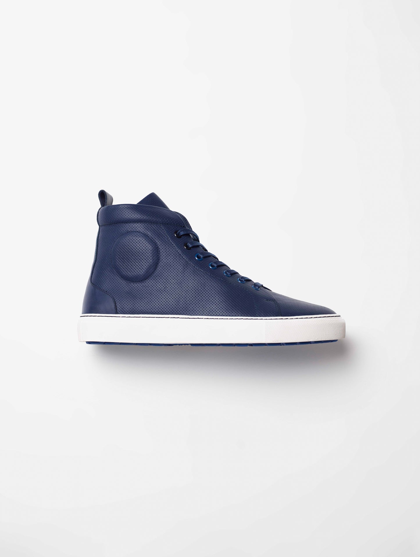 Side profile view of individual men's Dalton Sneaker in Nordic Navy blue from AETHER Apparel.