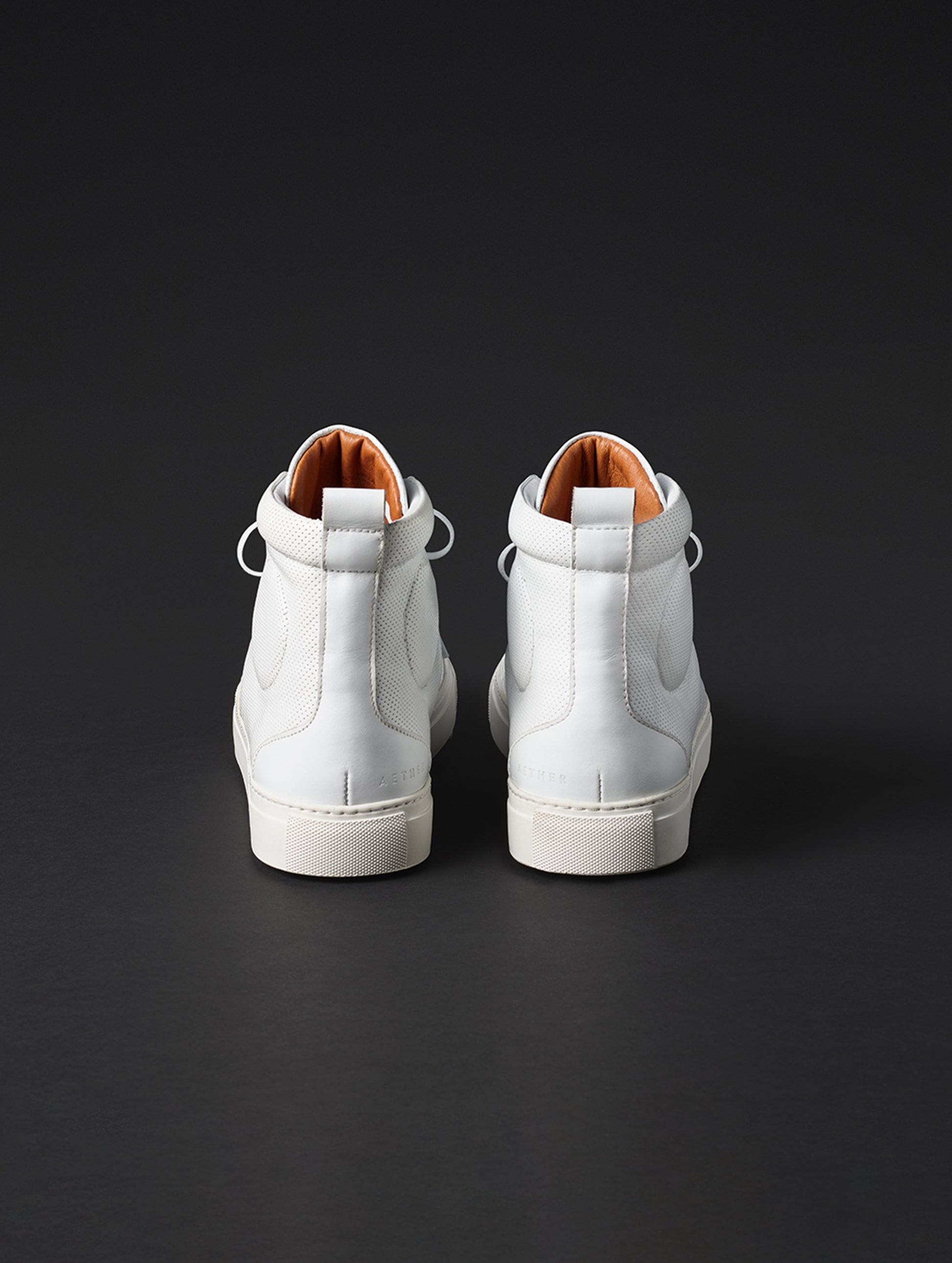 Rear view of men’s Dalton Sneaker in White from AETHER Apparel.