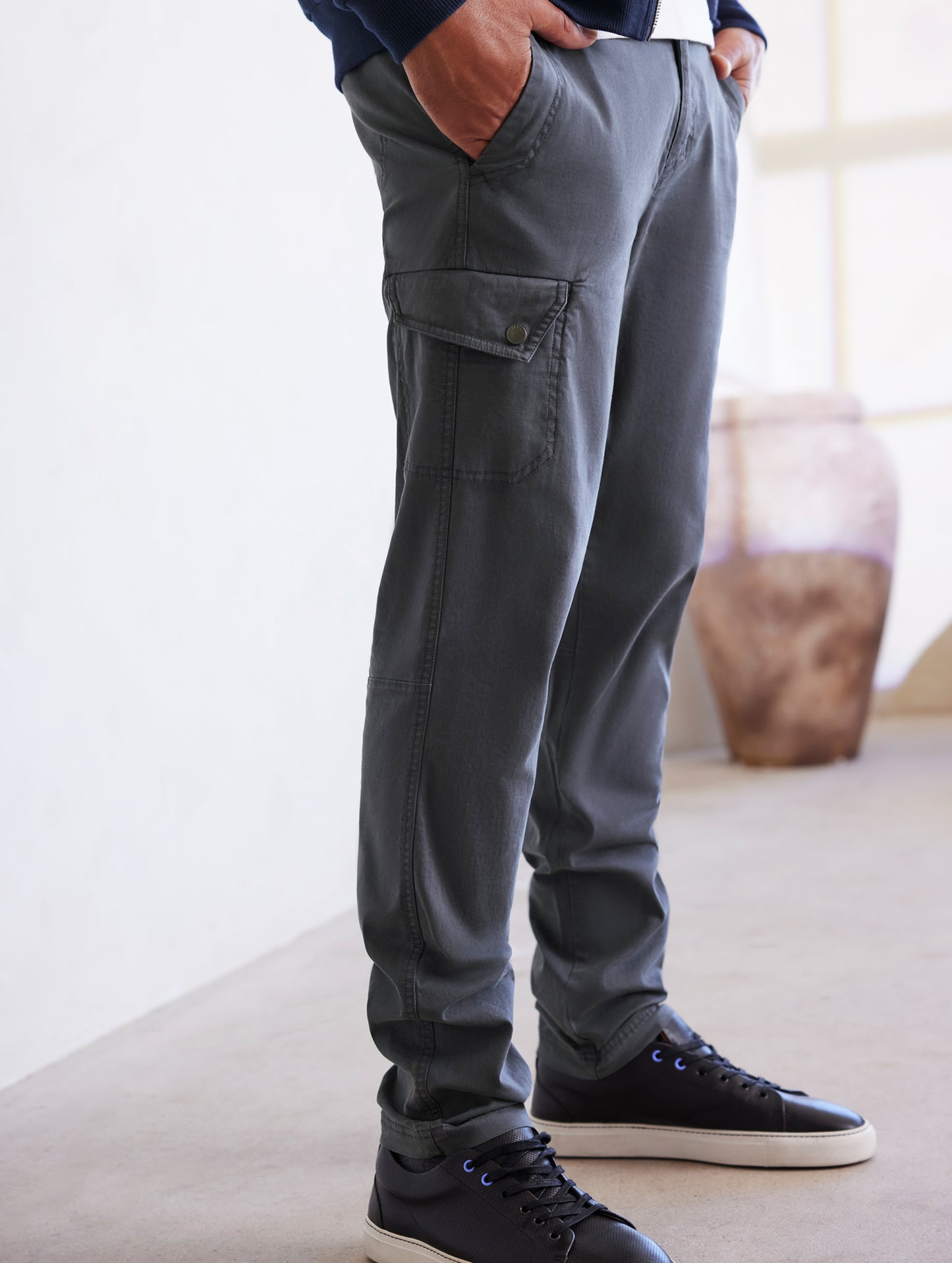 man wearing grey pants from AETHER Apparel