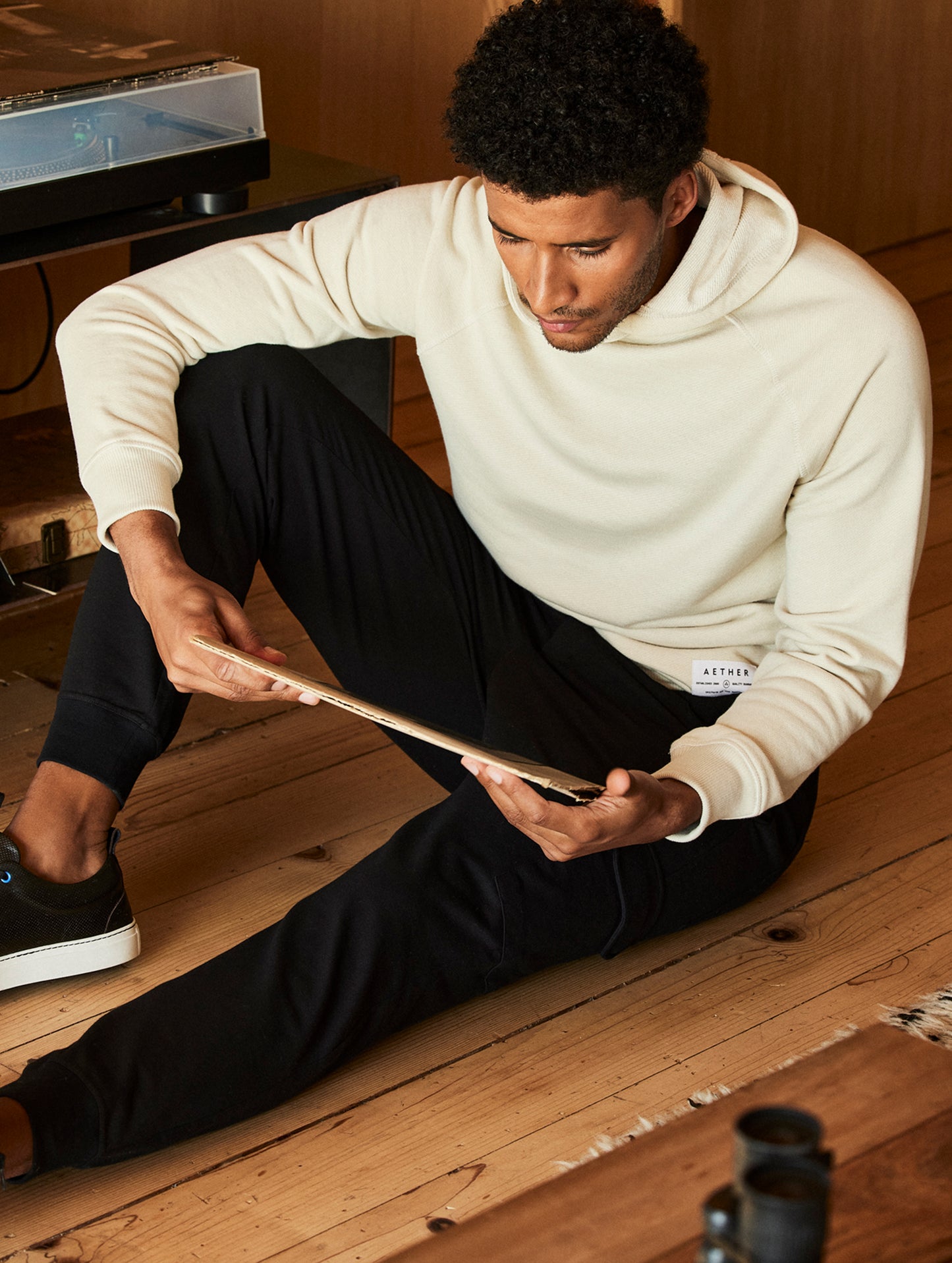 man wearing a beige hoodie