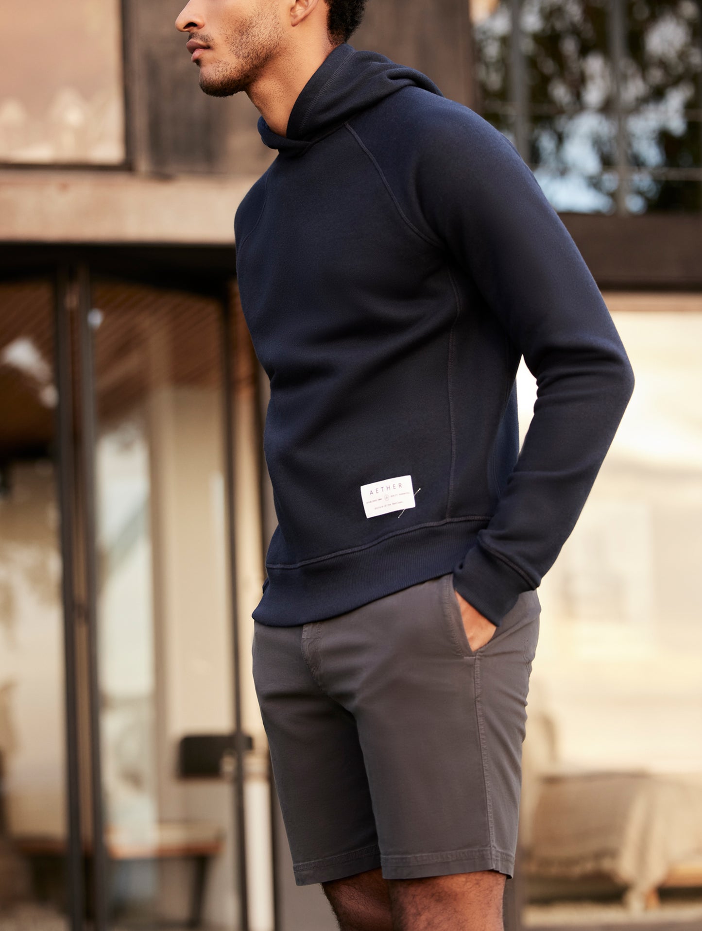 man wearing a navy hoodie