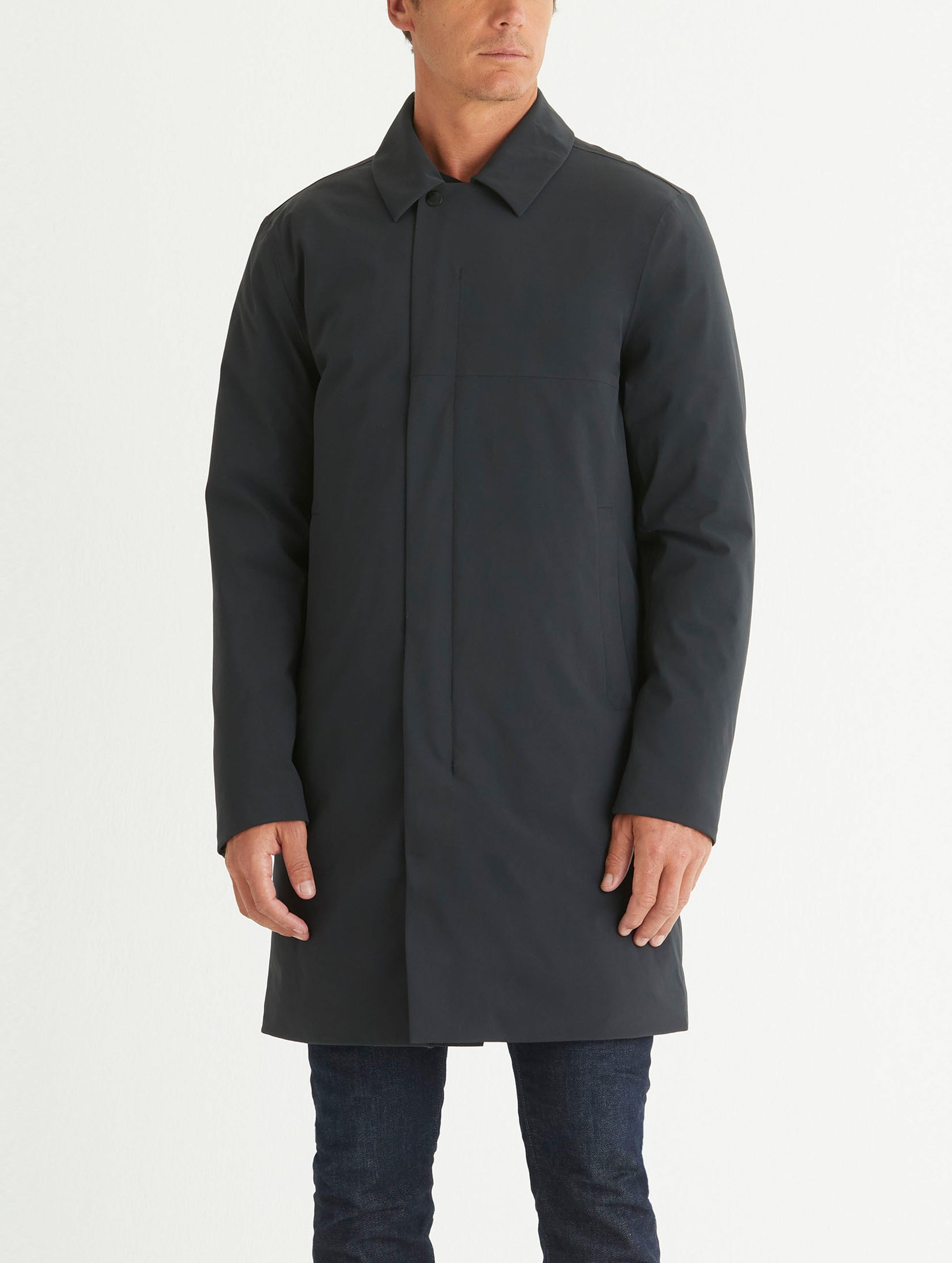 Front body view of man wearing Isaac Jacket in Onyx Black from AETHER Apparel.