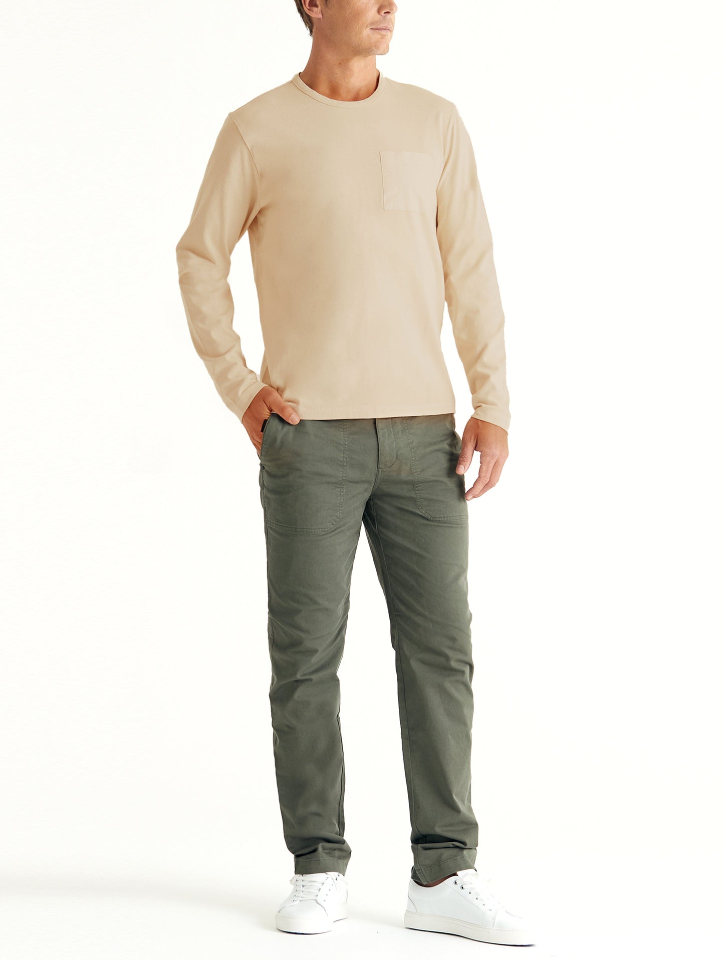 man wearing beige long sleeve shirt