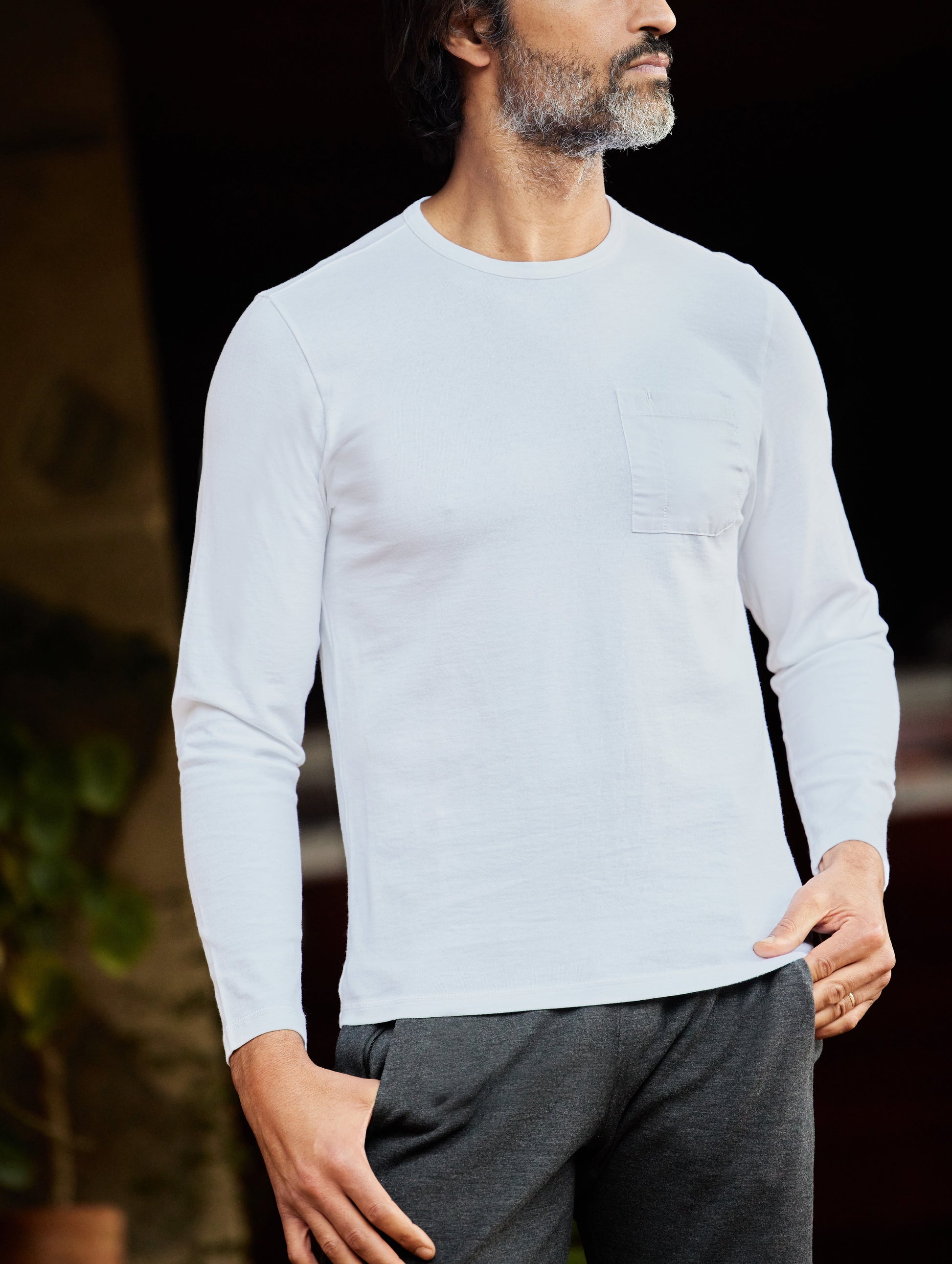 man wearing white long sleeve shirt