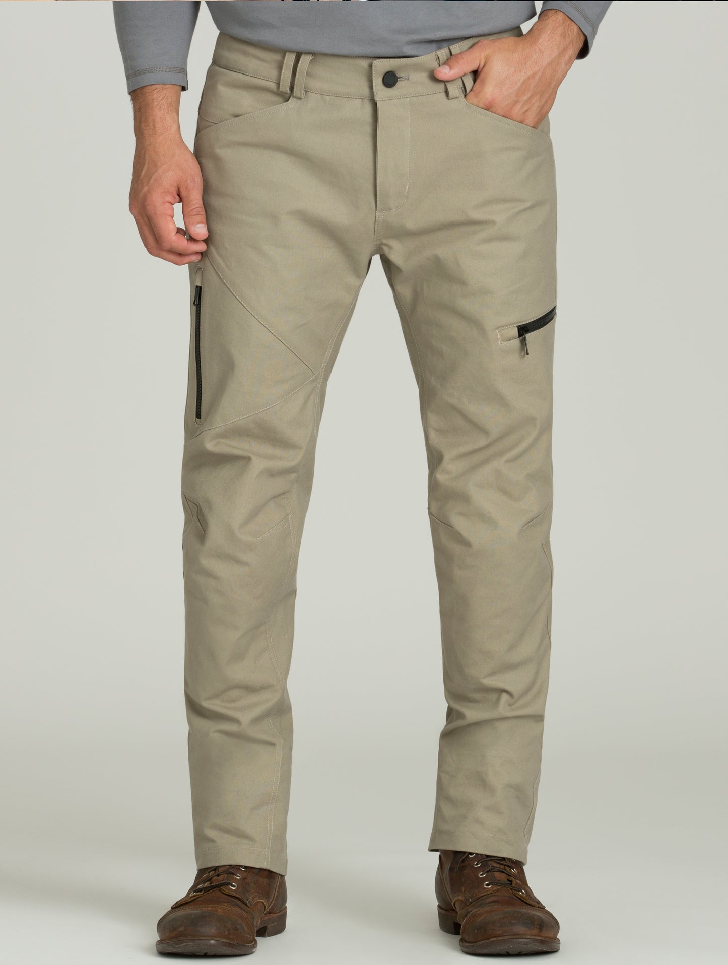 man wearing tan motorcycle pants