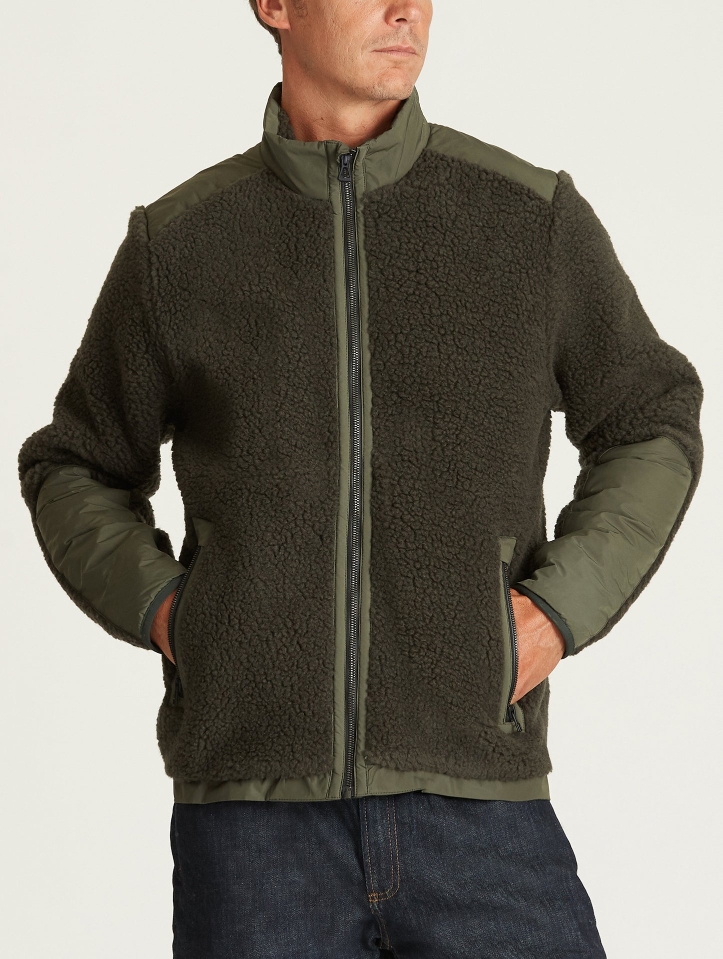 Front body view of man wearing Narrows Jacket in Duffle Green from AETHER Apparel.