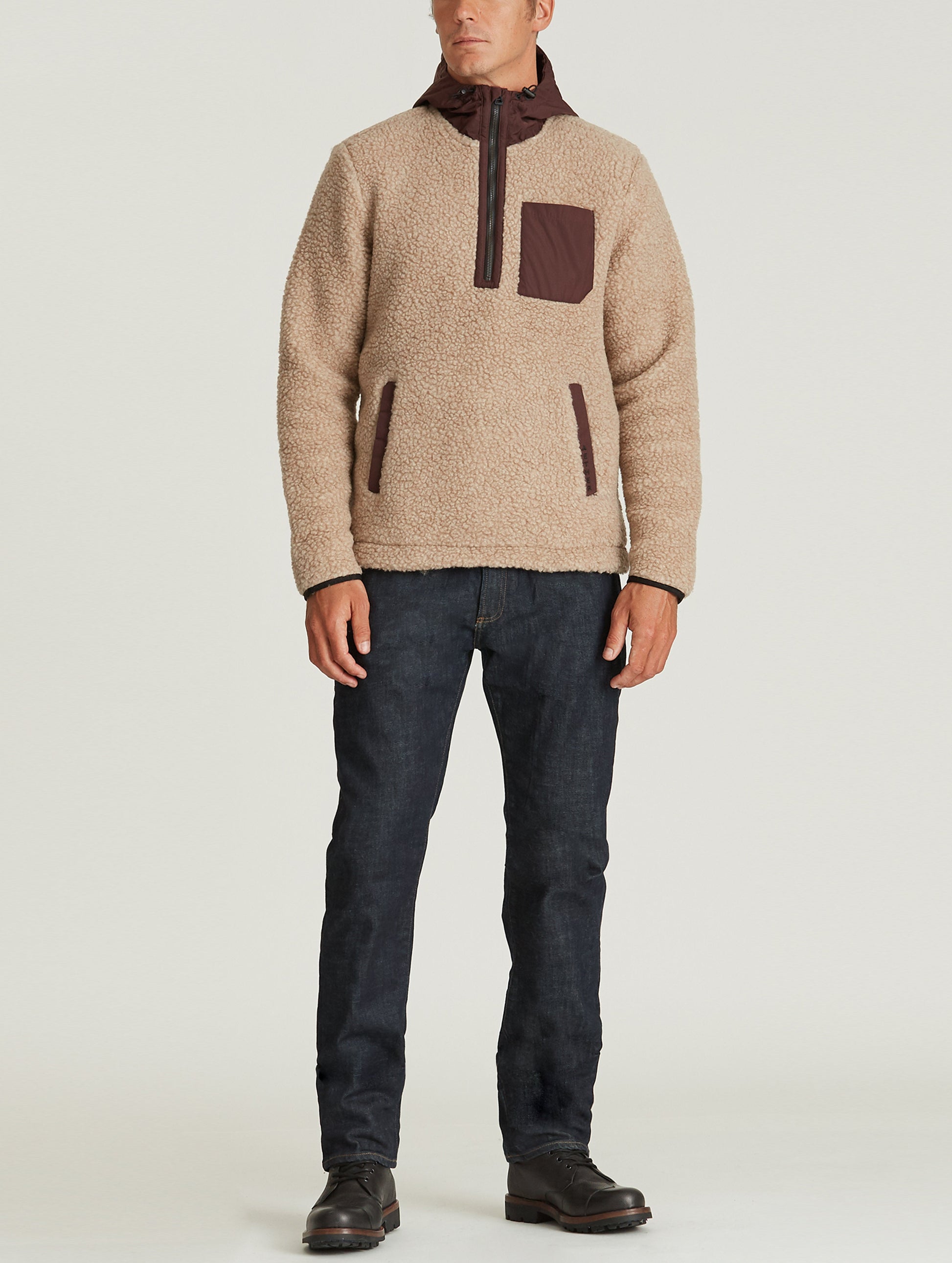 Front full-body view of man wearing Narrows Pullover in Camel from AETHER Apparel.