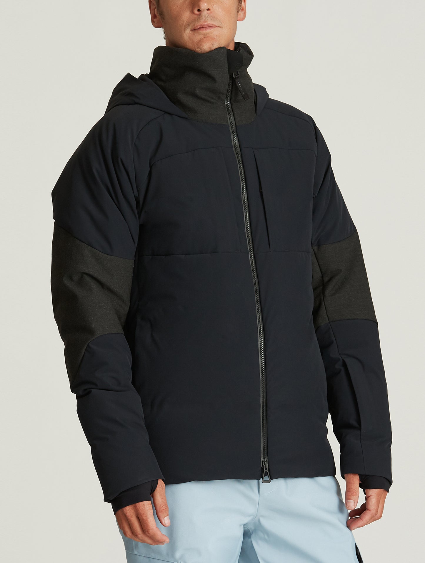 Front 3/4 body view of man wearing Torino Jacket in Onyx Black from AETHER Apparel.