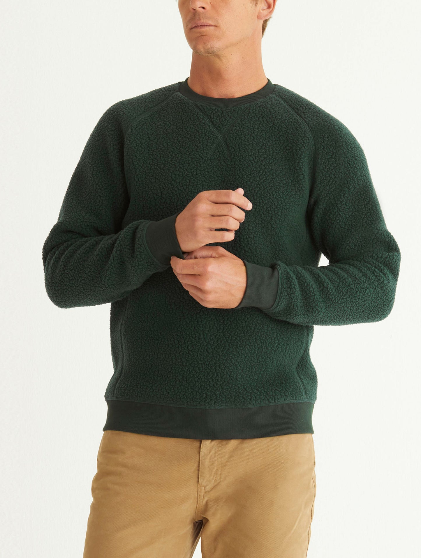 man wearing green fleece sweater