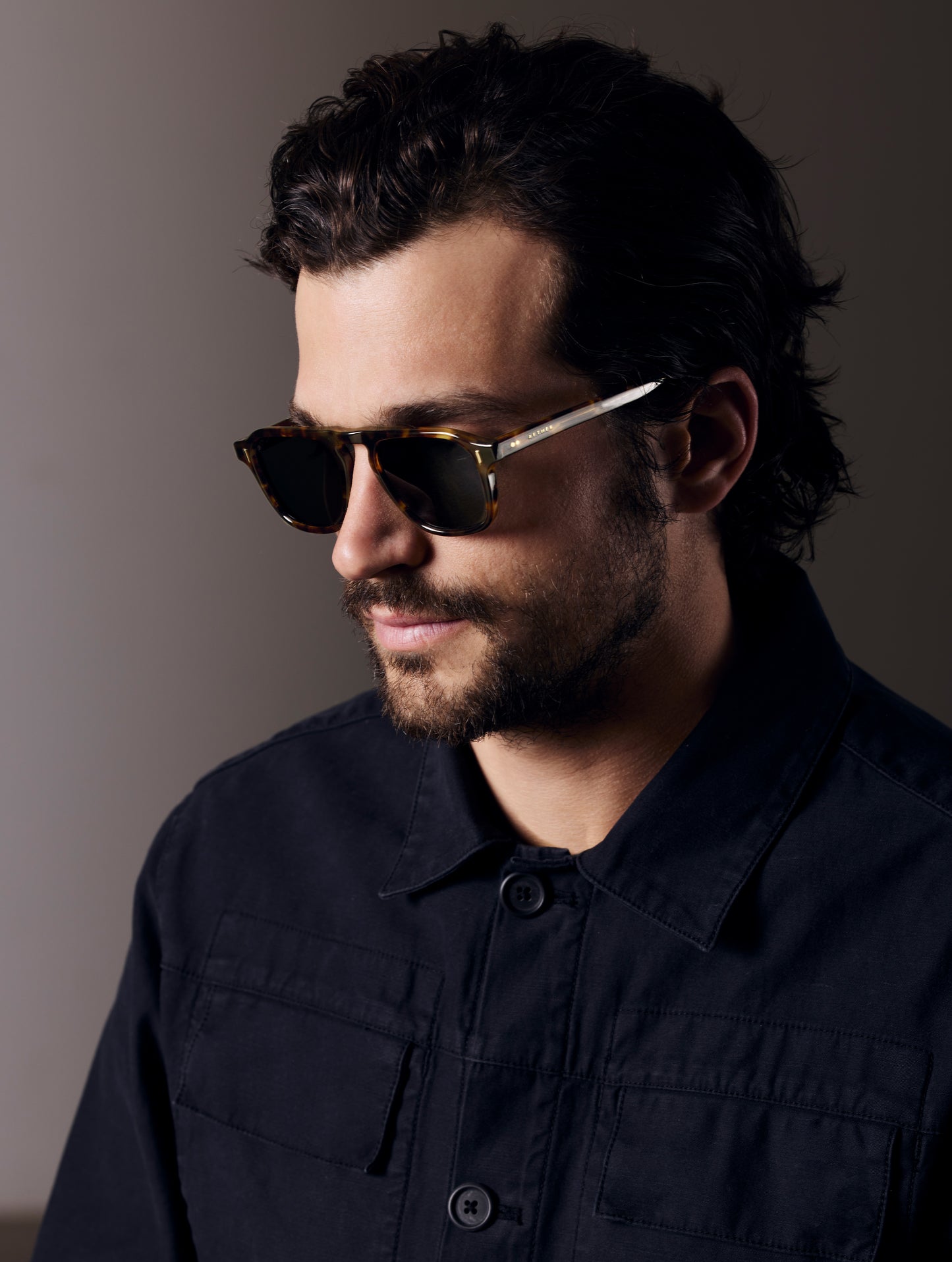 Front left 3/4 view of man wearing Sequoia Sunglass in Tortoise with Deep G15 Lens from AETHER Apparel.