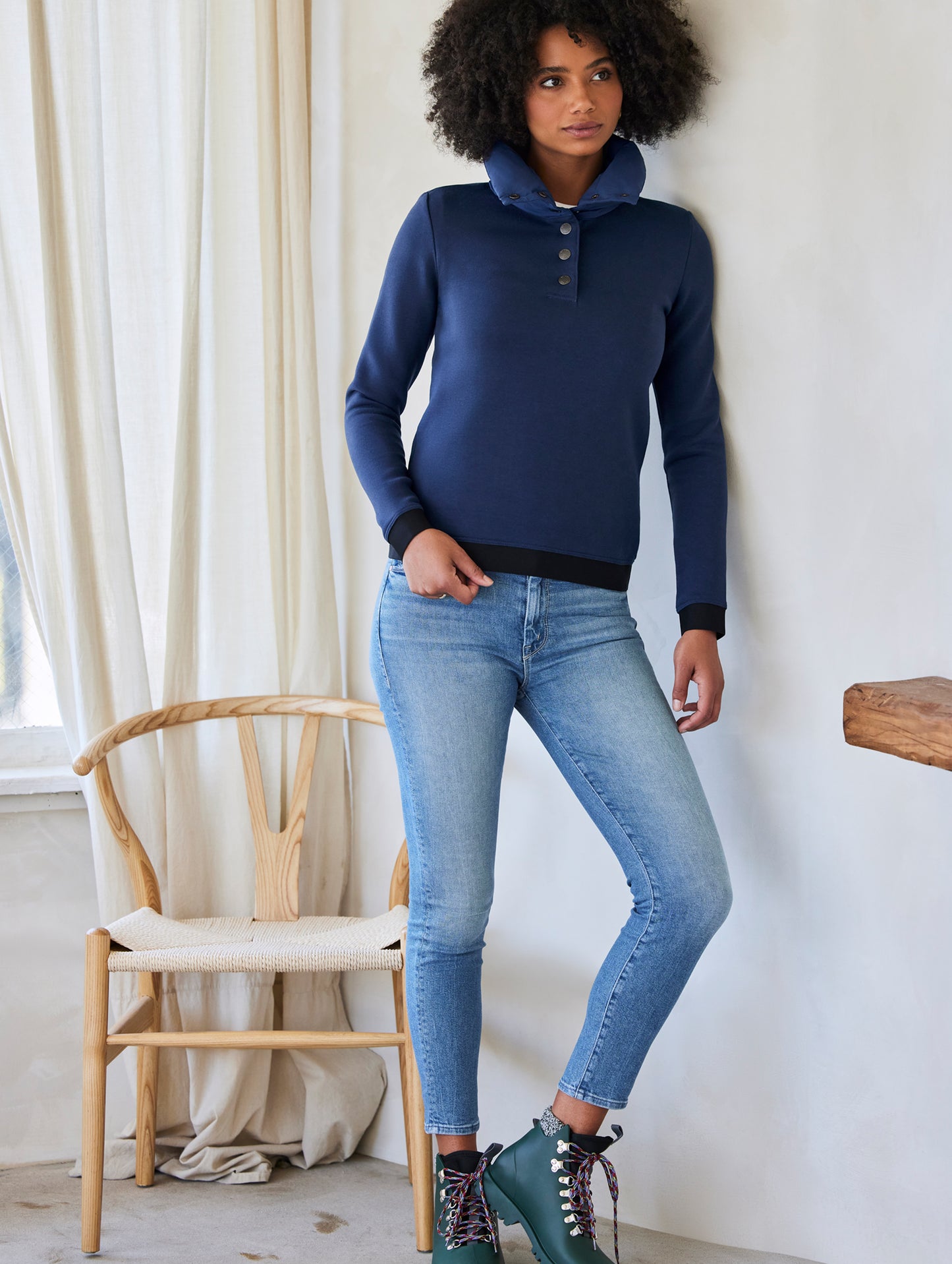 Woman wearing blue Align Pullover from AETHER Apparel