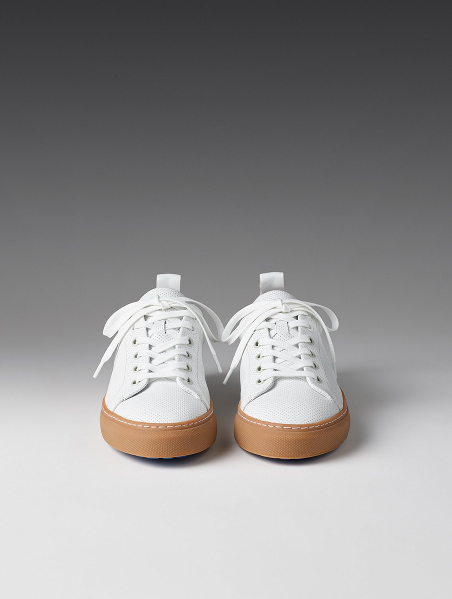 Front view of women's Dalton Low-Top Sneaker in White from AETHER Apparel.